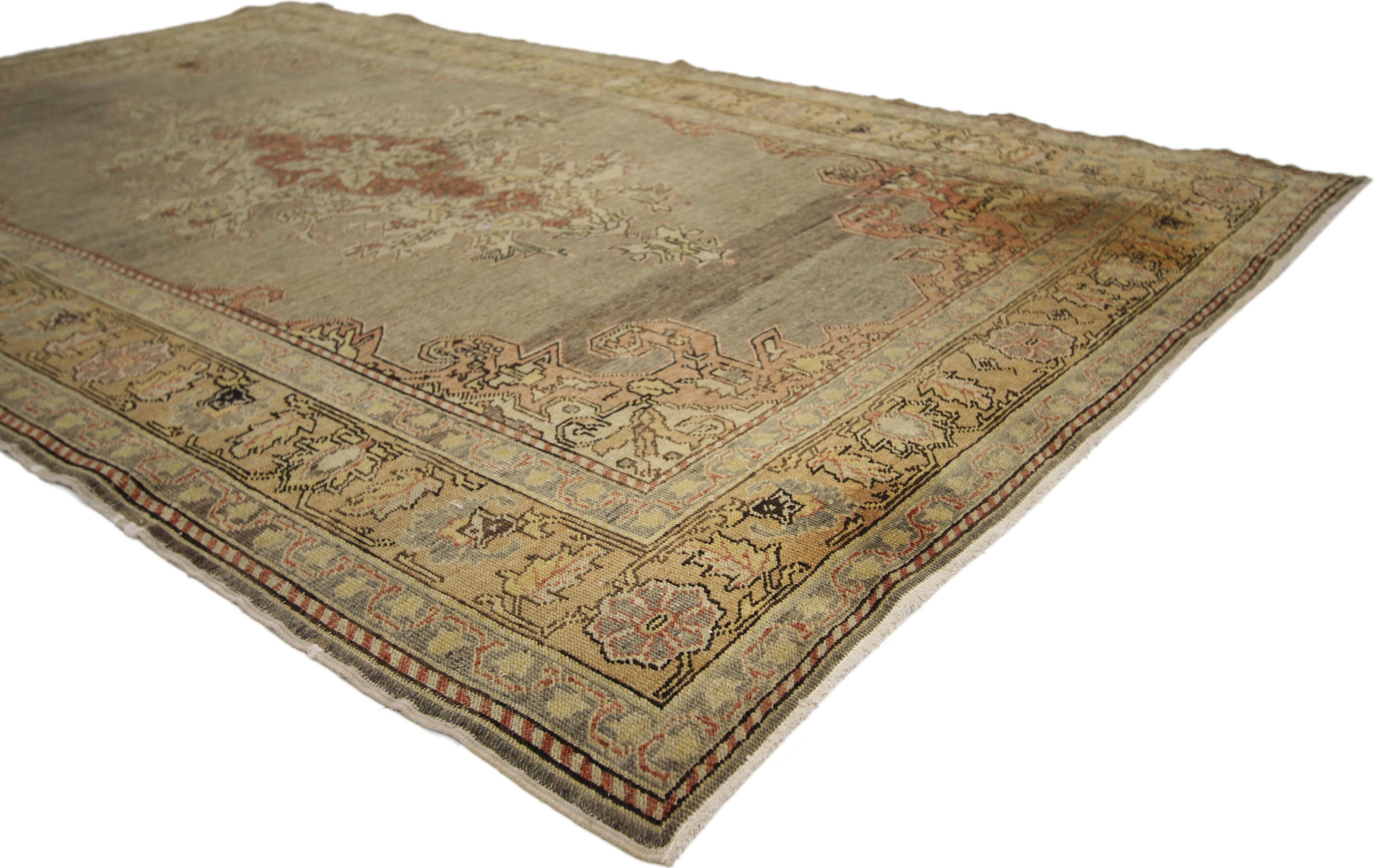 73742 Distressed Antique Turkish Sivas Rug 04'01 x 06'04. ​​​Warm and inviting with its, rugged beauty, this hand-knotted distressed antique Turkish Sivas rug is poised to impress. The lovingly time-worn gray hued field features a central medallion