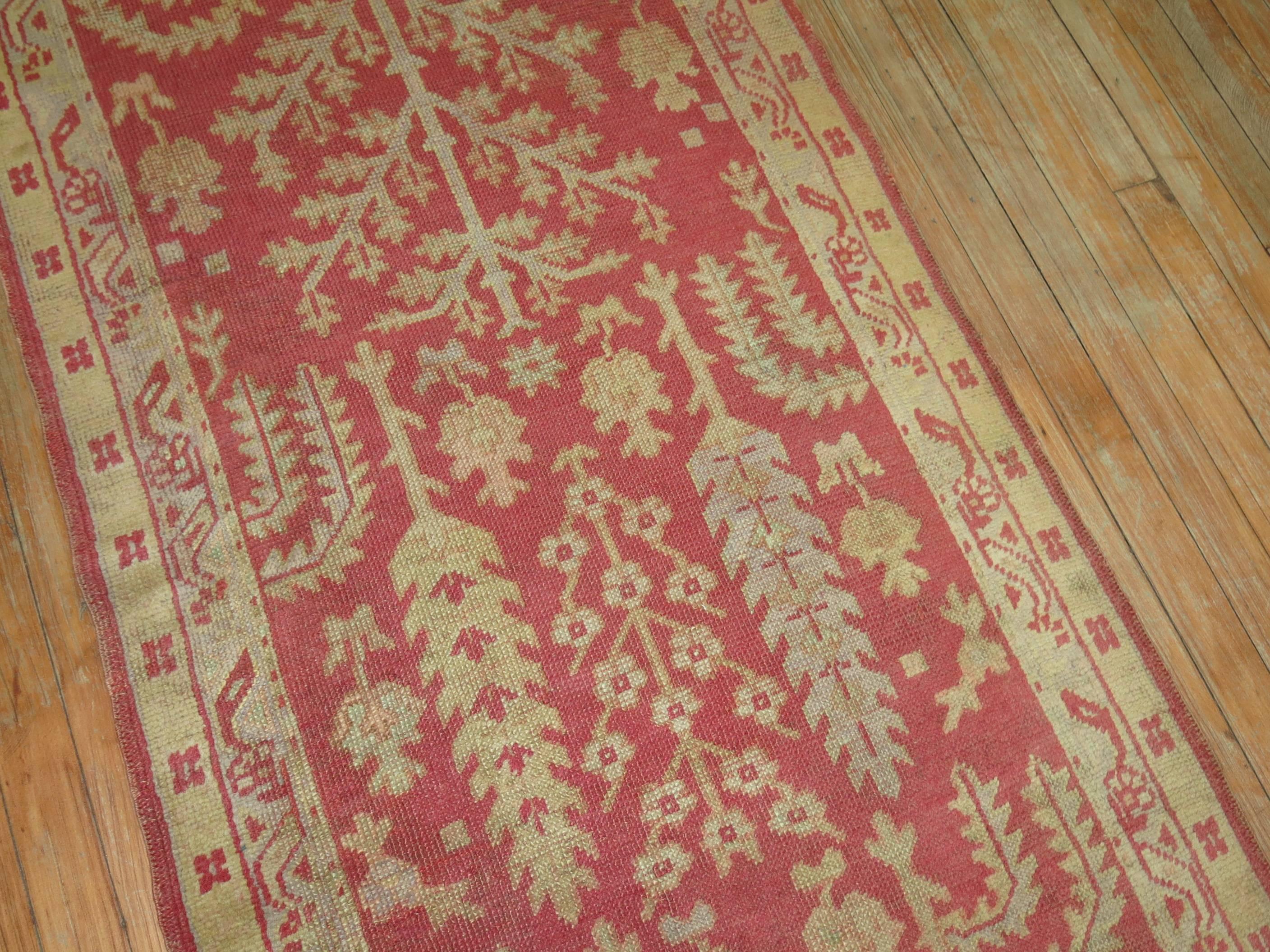 A fine quality Turkish Oushak runner featuring a cypress tree design.