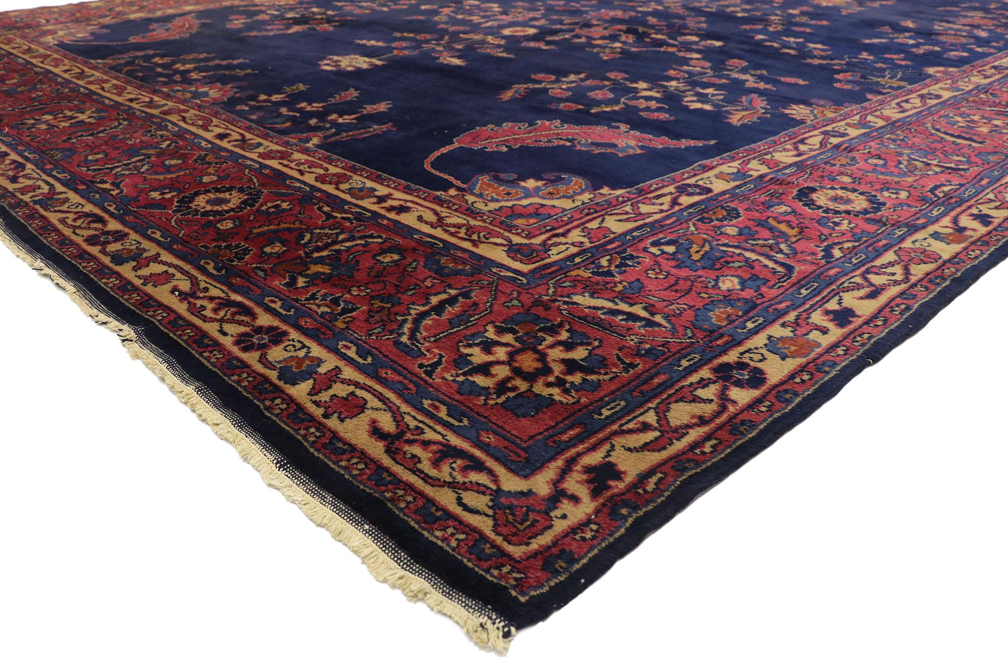 72027 Antique Turkish Sparta Palace Size Rug with Luxe Victorian Style 11'01 x 20'02. Rich in color, texture and beguiling ambiance, this hand knotted wool palace size antique Sparta rug beautifully embodies a luxe Victorian style. The abrashed navy
