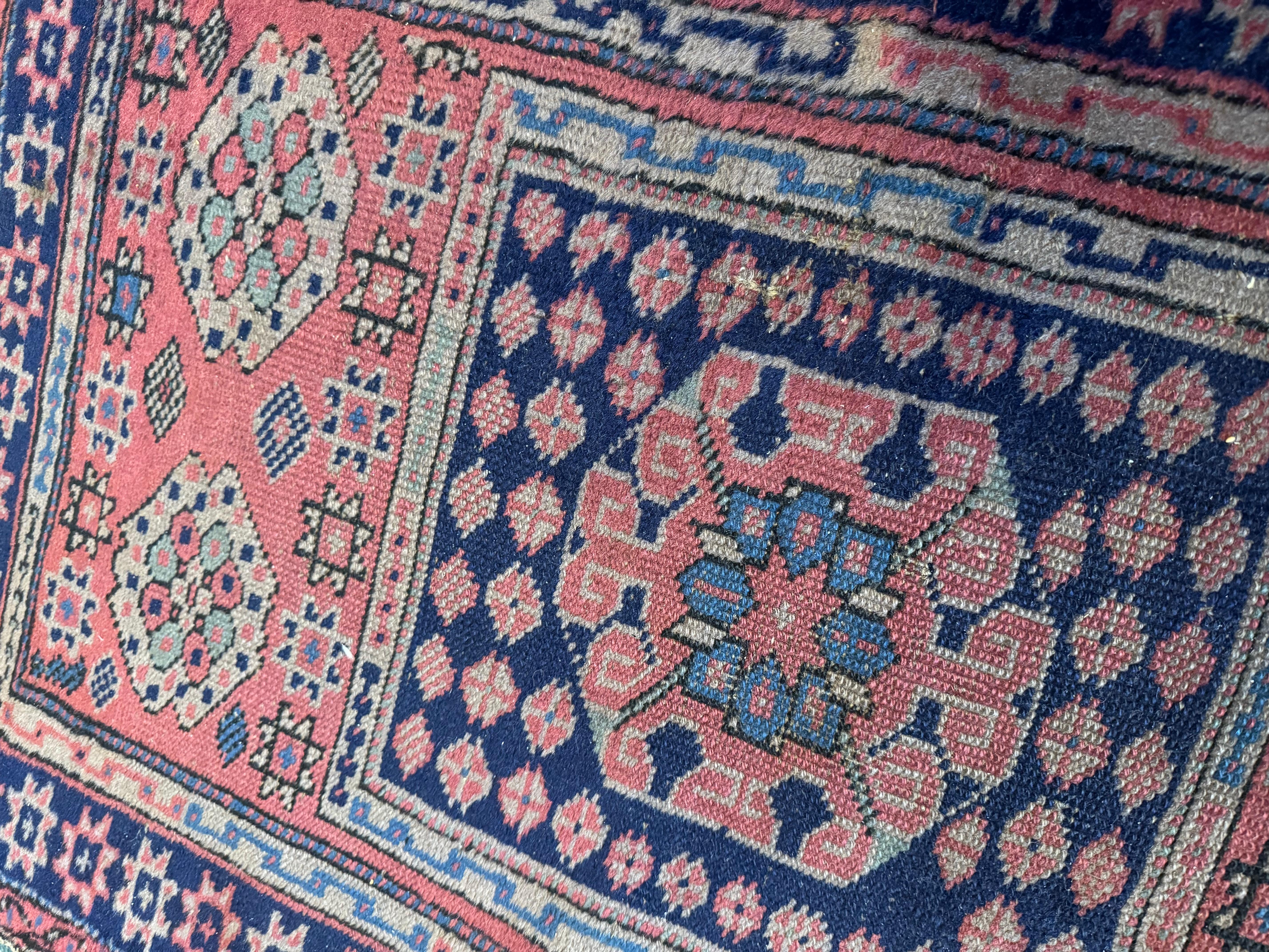 Antique Turkish Sparta Short and Narrow Pink Rose Geometric Runner Rug In Good Condition For Sale In New York, NY