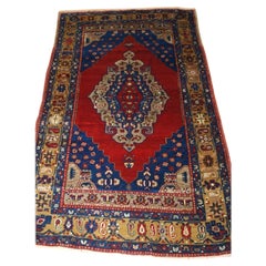 Antiker türkischer Taspinar Dorfteppich mit klassischem Medaillon-Design