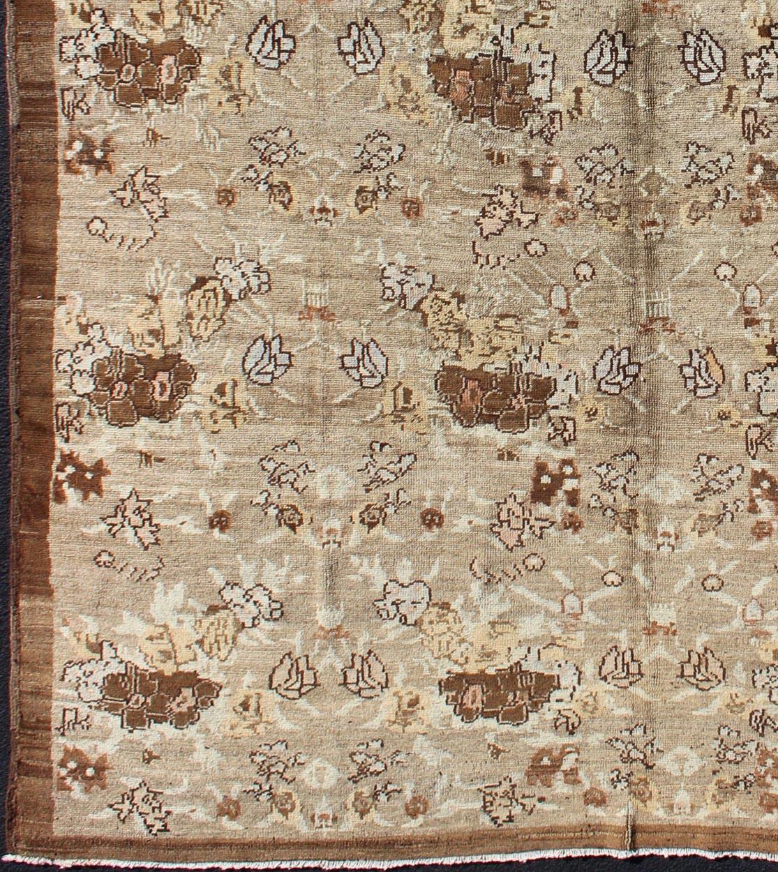 Large Antique Turkish Tulu Carpet with Floral Design in Tan & Brown, Rug/NA-75020, 

This unusually large Tulu features an all-over floral design in Tan and Taupe. The earth tone colors are complemented by a solid brown border. Other colors include