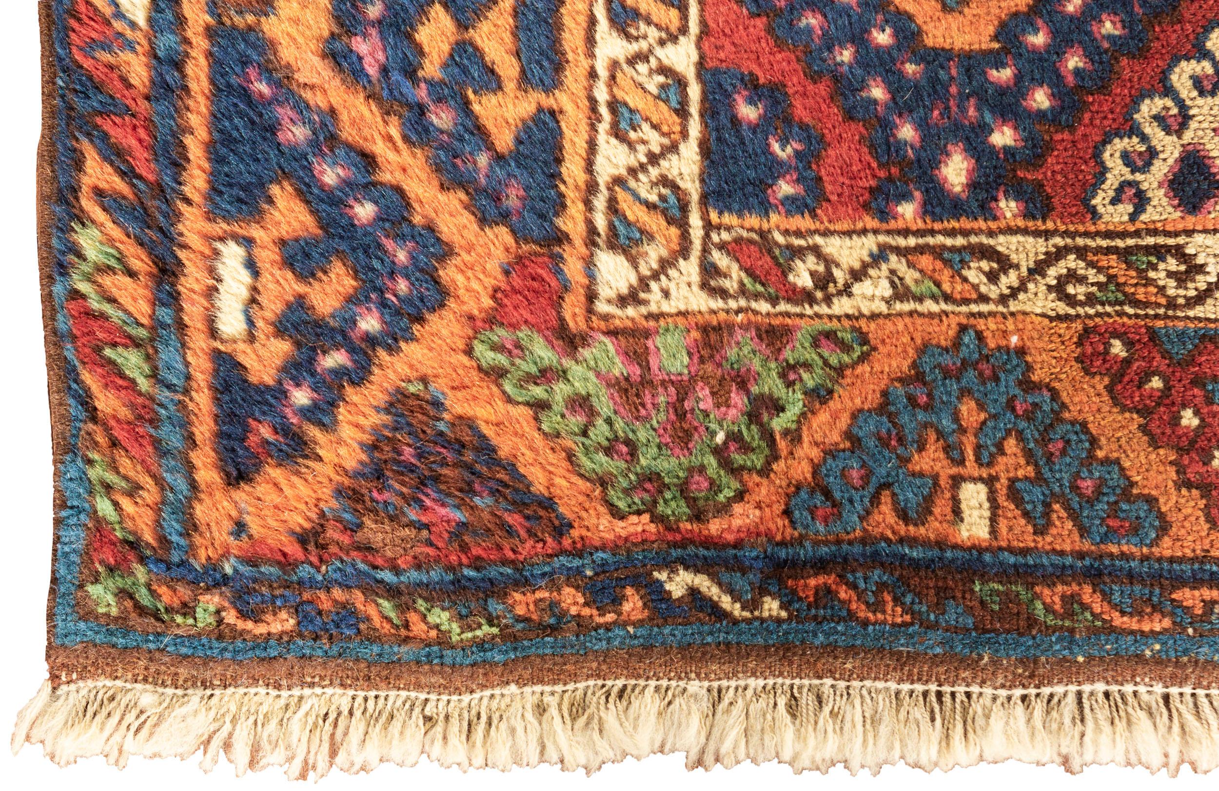 An antique Turkish Yoruk rug, circa 1880. The Yoruk's are a tribal people that predate the Turkomans, primarily inhabiting the mountains of Anatolia and their weavings are detailed and difficult to find, each piece is unique. The Yoruk's are a