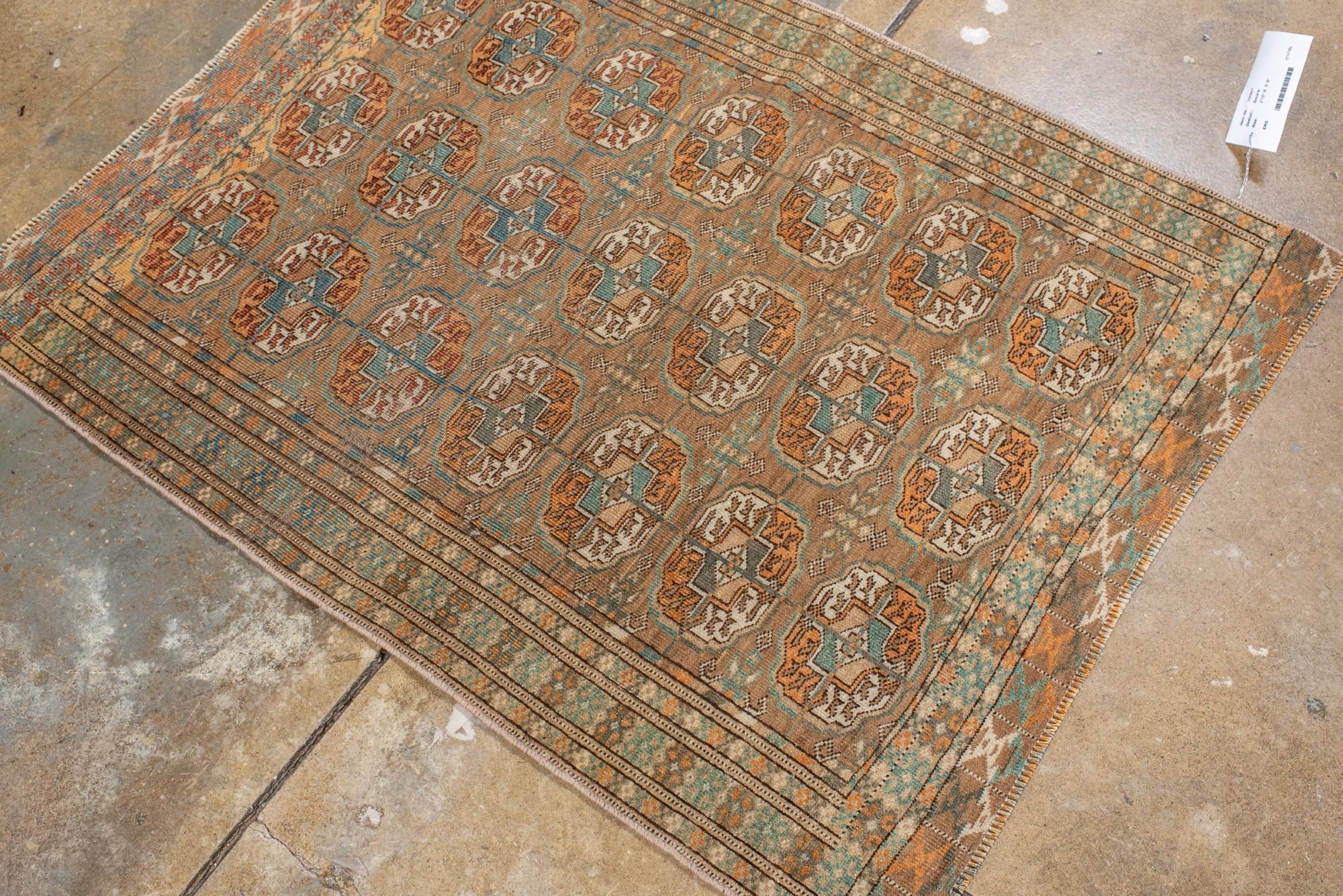 Antique Turkmen Bokara Rug with Repeating Gül Motifs siglo XX en venta