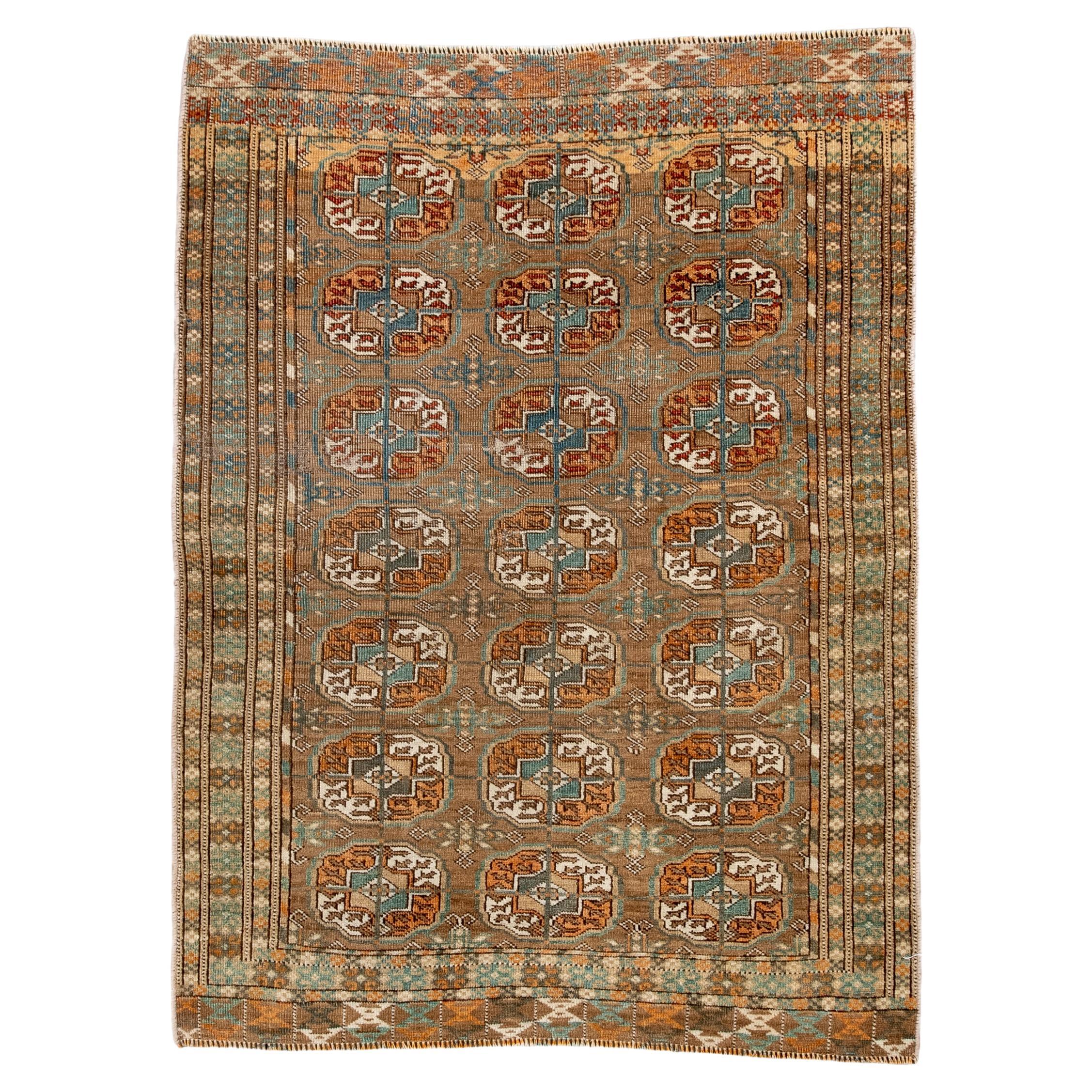 Antique Turkmen Bokara Rug with Repeating Gül Motifs