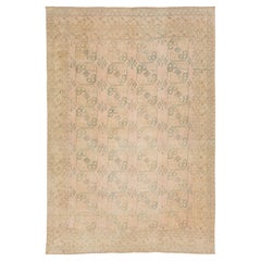 Tapis ancien Turkmen Gul - Abricot fondu et Sage Tapis tribal géométrique en laine