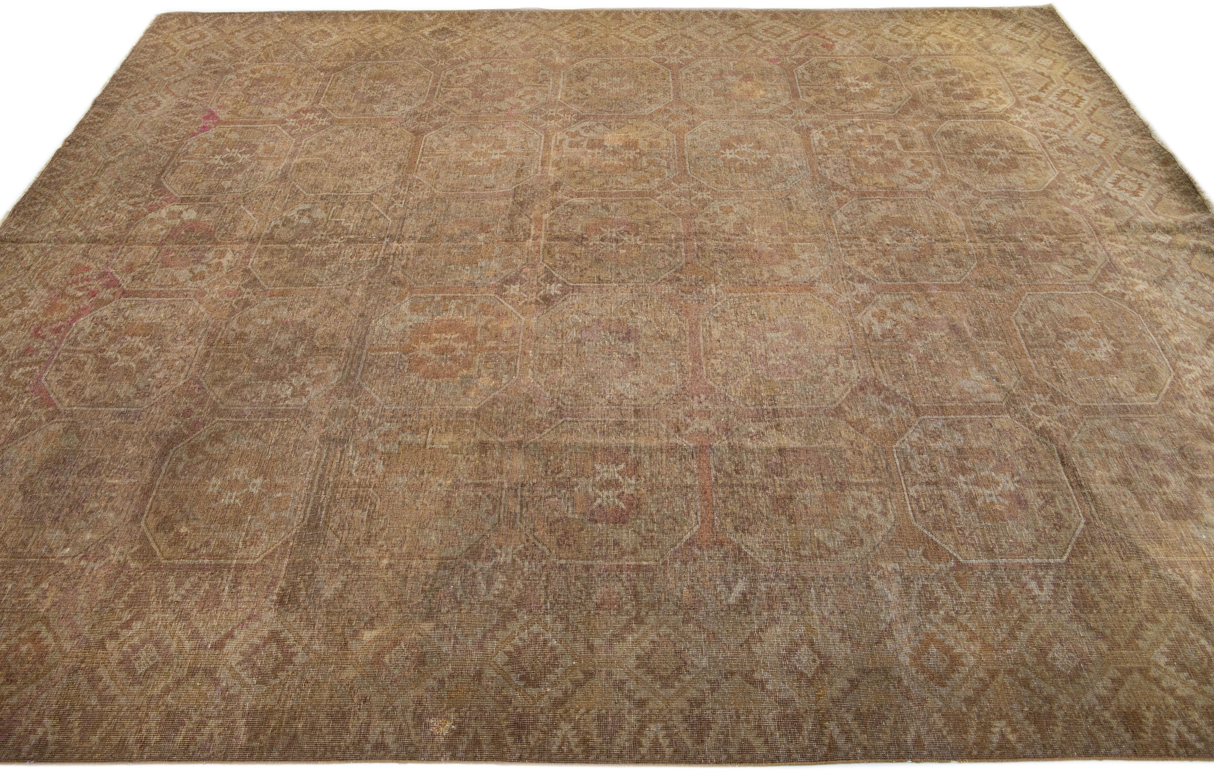 Hand-Knotted Antique Turkmen Handmade Brown Wool Rug with Gul Design For Sale