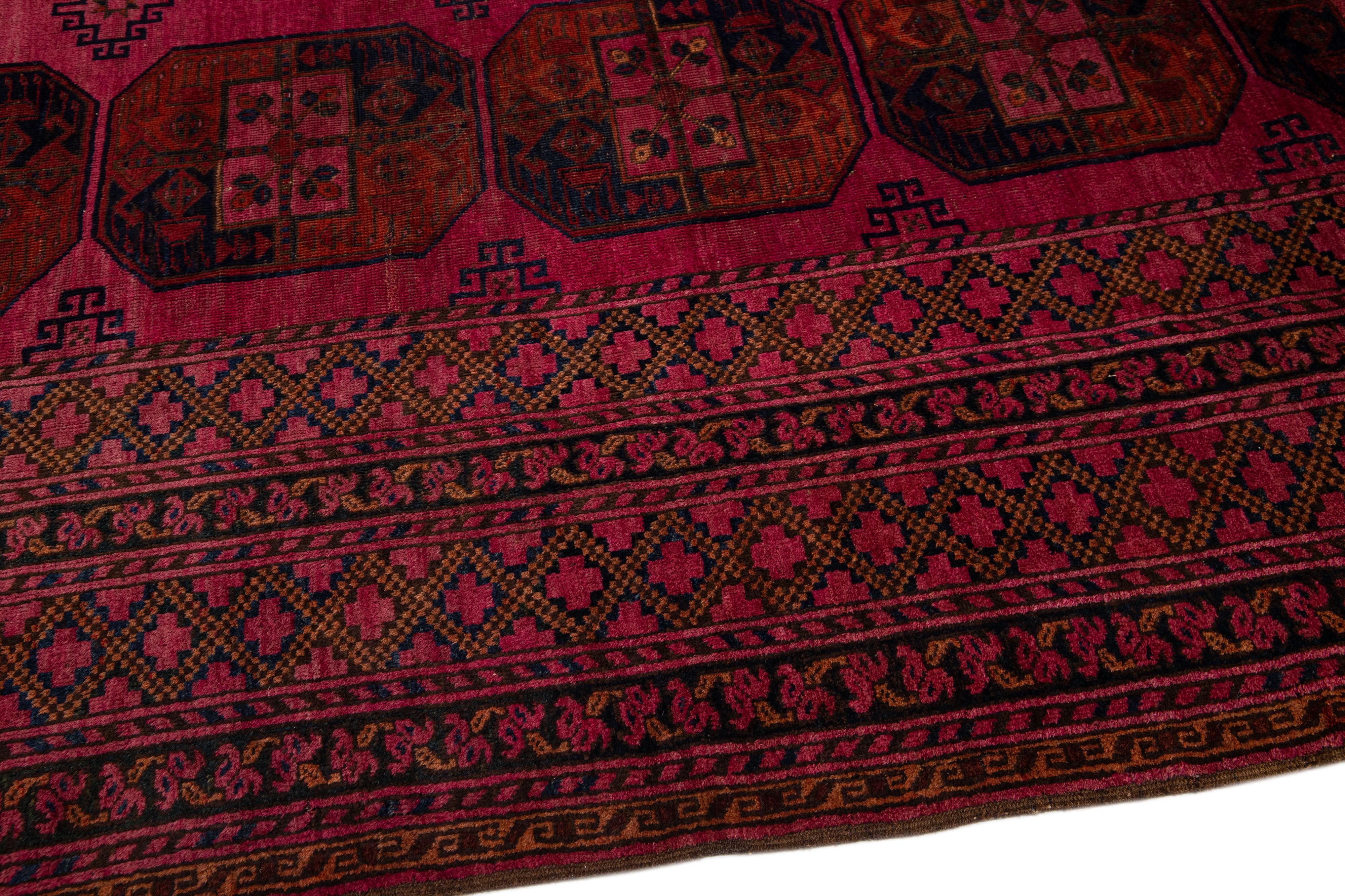 20th Century Antique Turkmen Handmade Red Oversize Wool Rug with Gul Motif For Sale