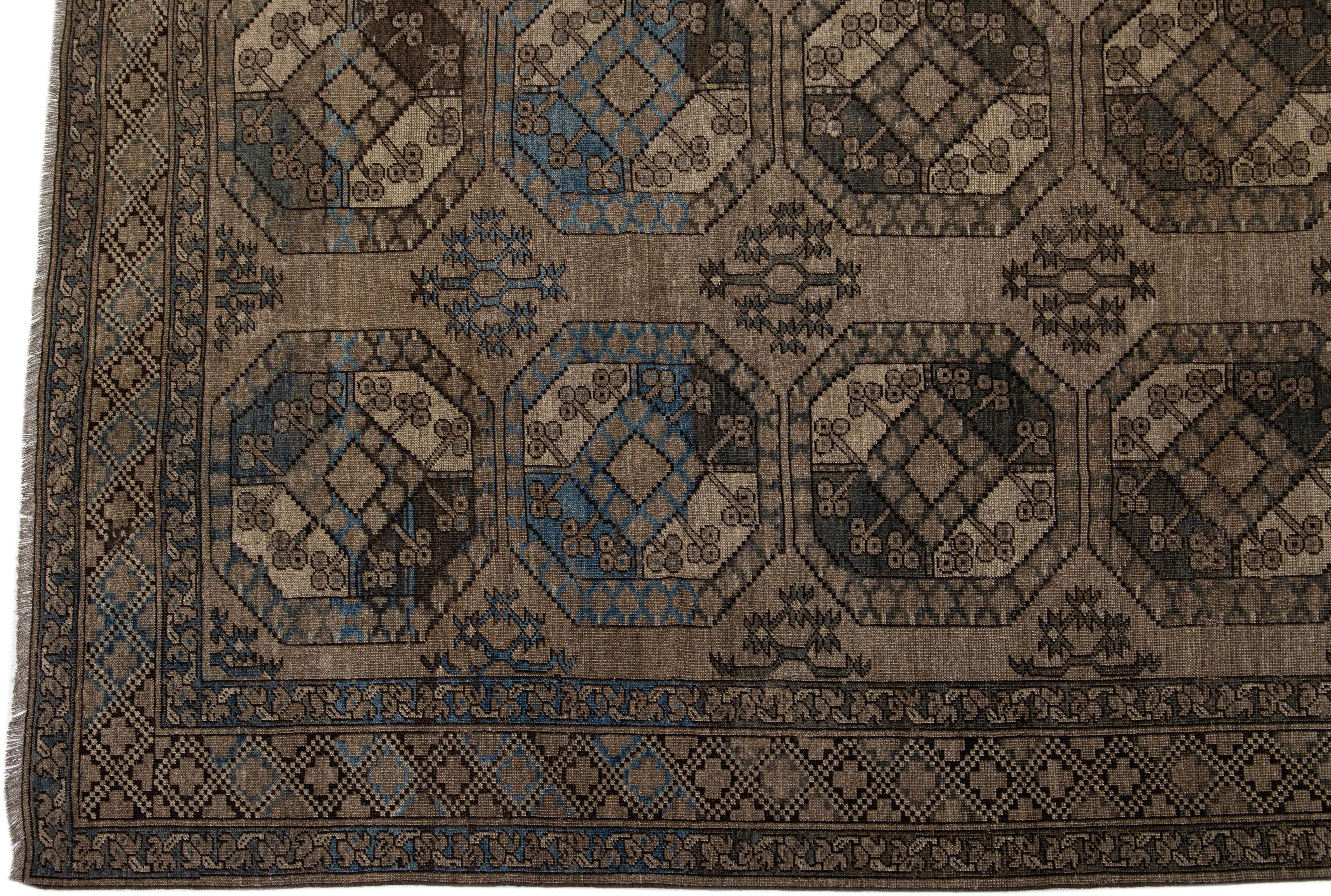 Islamic Antique Turkmen Handmade Wool Brown Rug with Gul Design For Sale