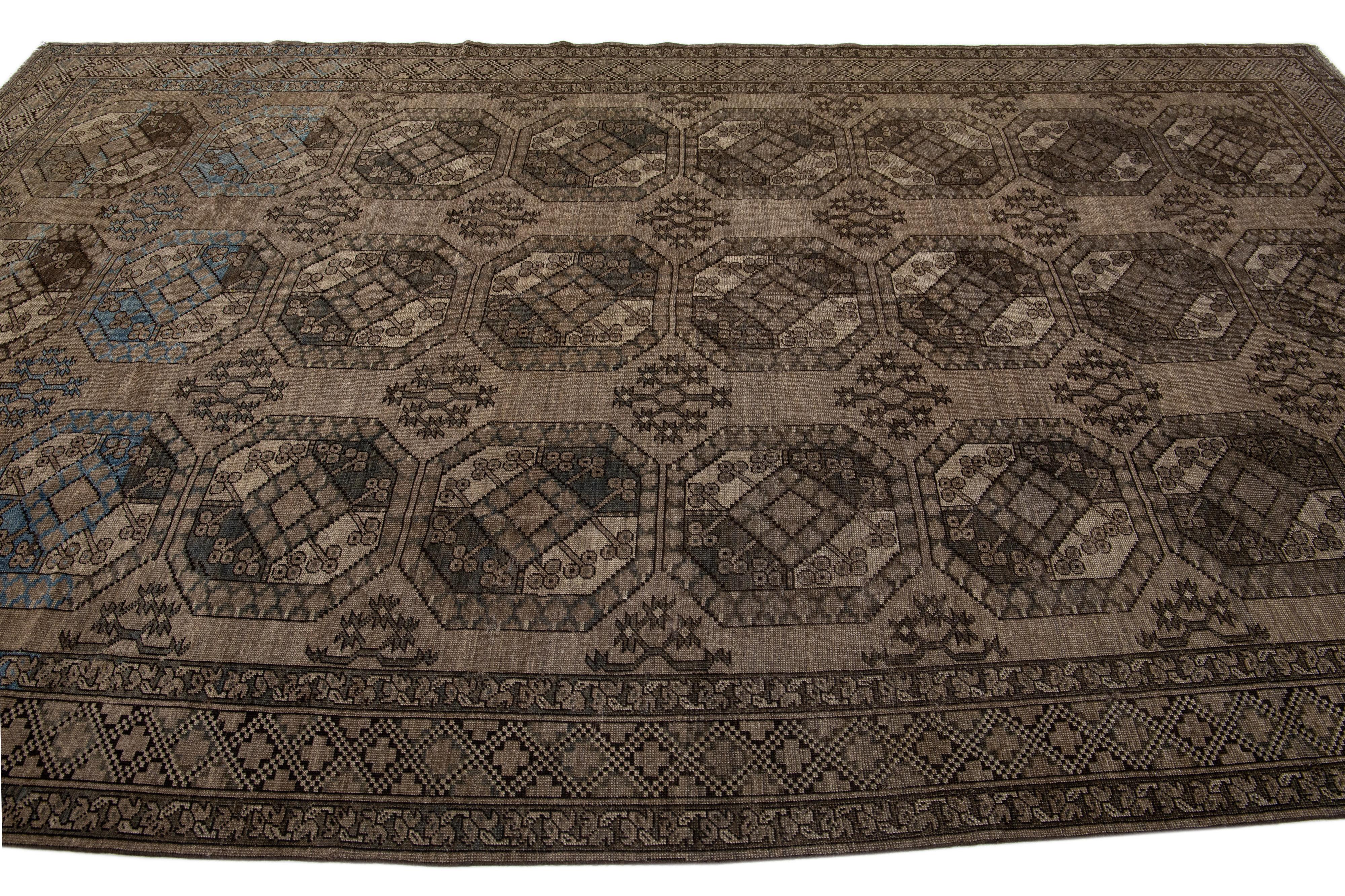 Hand-Knotted Antique Turkmen Handmade Wool Brown Rug with Gul Design For Sale
