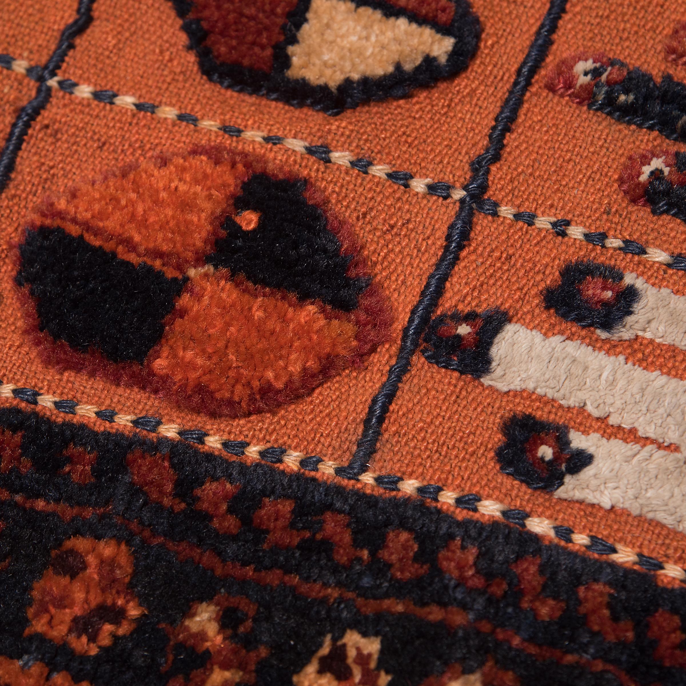 Woven in the late 19th century, this colorful Turkmen textile was originally used by a nomadic traveler as an artful covering for his horse. Placed between the saddle and the horse, the blanket cushioned the rigid saddle, protected from harsh winds,