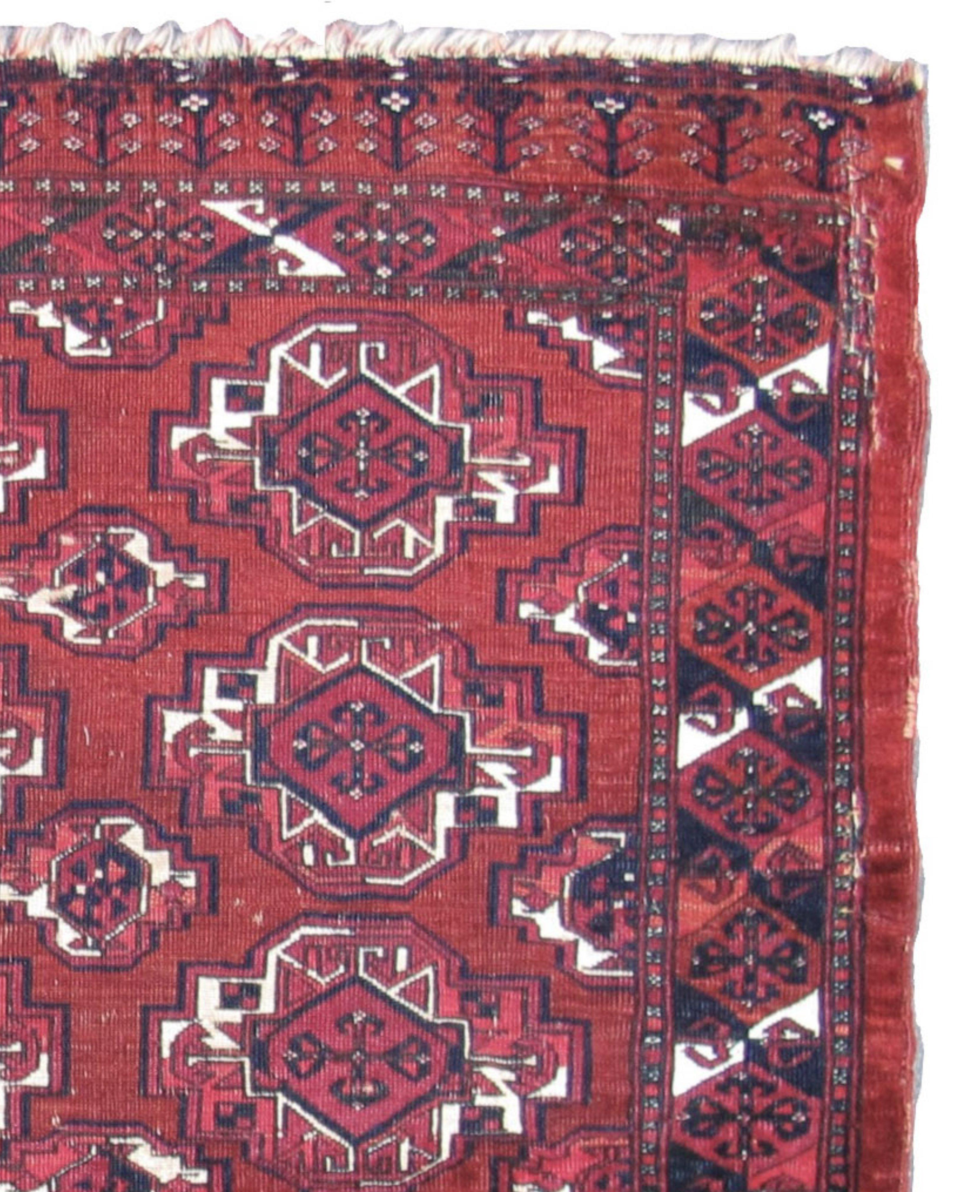 Antique Turkmen Saryk Chuval, 19th Century

Saryk bags and trappings are some of the most opulent of Turkmen weavings. This large Saryk tent bag uses wool pile with cotton white as well as gold and cochineal pink silk highlights. Using a burgundy