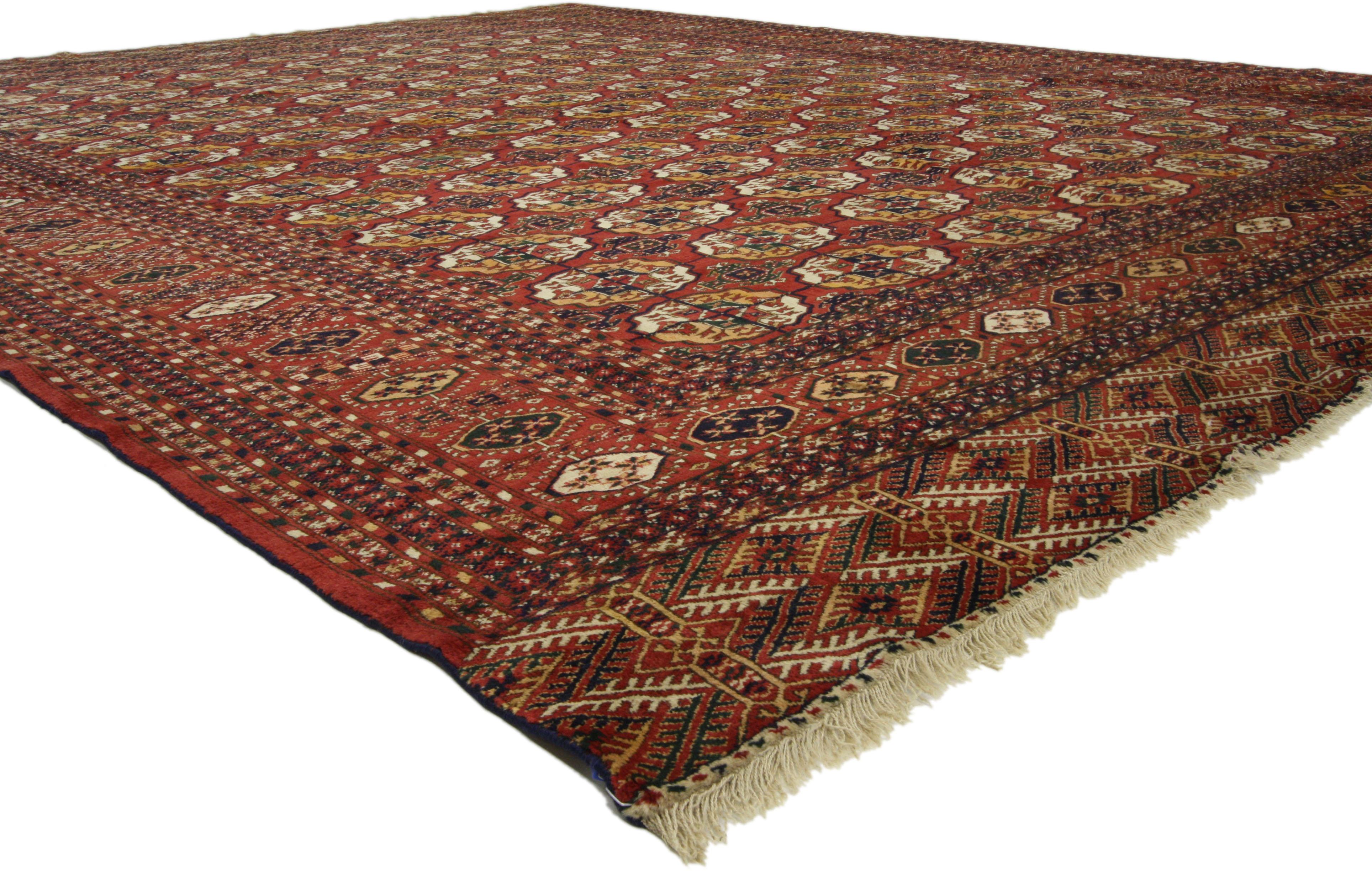 73357, antique Turkmenistan Tekke rug, Tekke main carpet. This antique Tekke rug features seven vertical columns of the Tekke gül with secondary Gurbaghe güls used by Turkoman tribes. This all-over güls pattern is also known as elephant foot motifs.