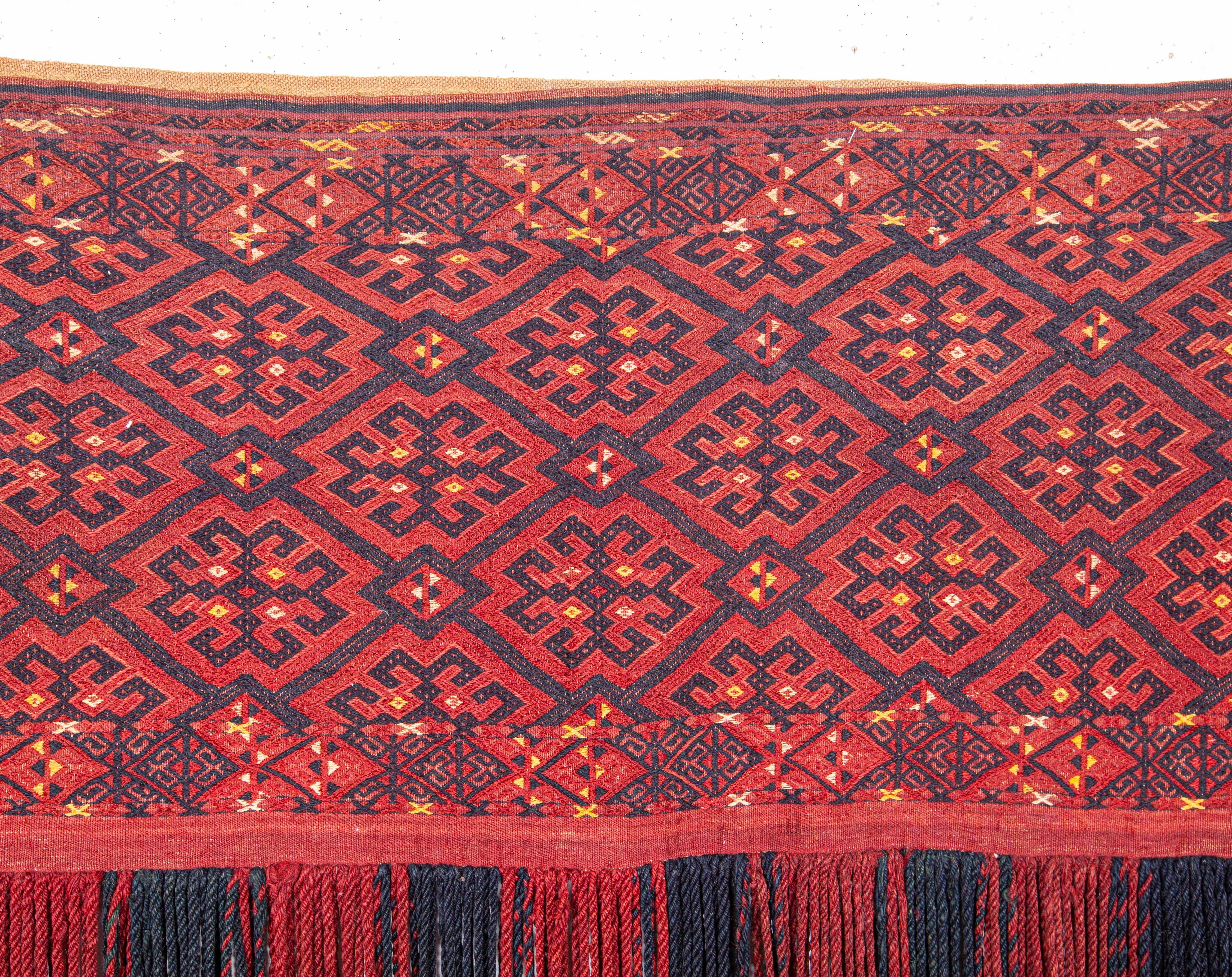 This is an example to a group of bags used as animal and tent trappings. This is as complete as they get in reasonably good condition and full decor on, early 20th century.