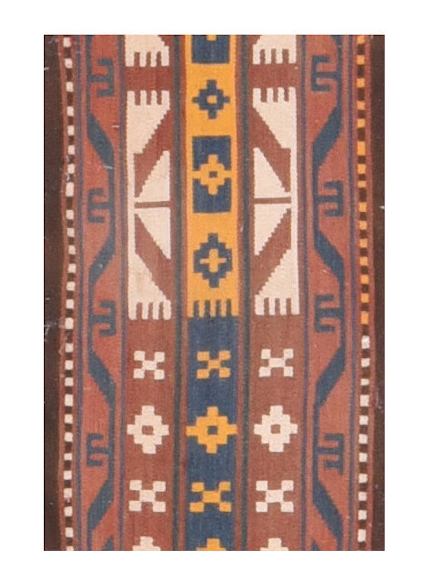 Antique Turkmen Tent Band 1'2'' x 42''. This warp faced packing or tent band shows a zig-zag, diamond, square meander, quincunx , triangle, wave and double comb pattern in red, navy, ecru and gold. Square braided tassels and tie cords. A true