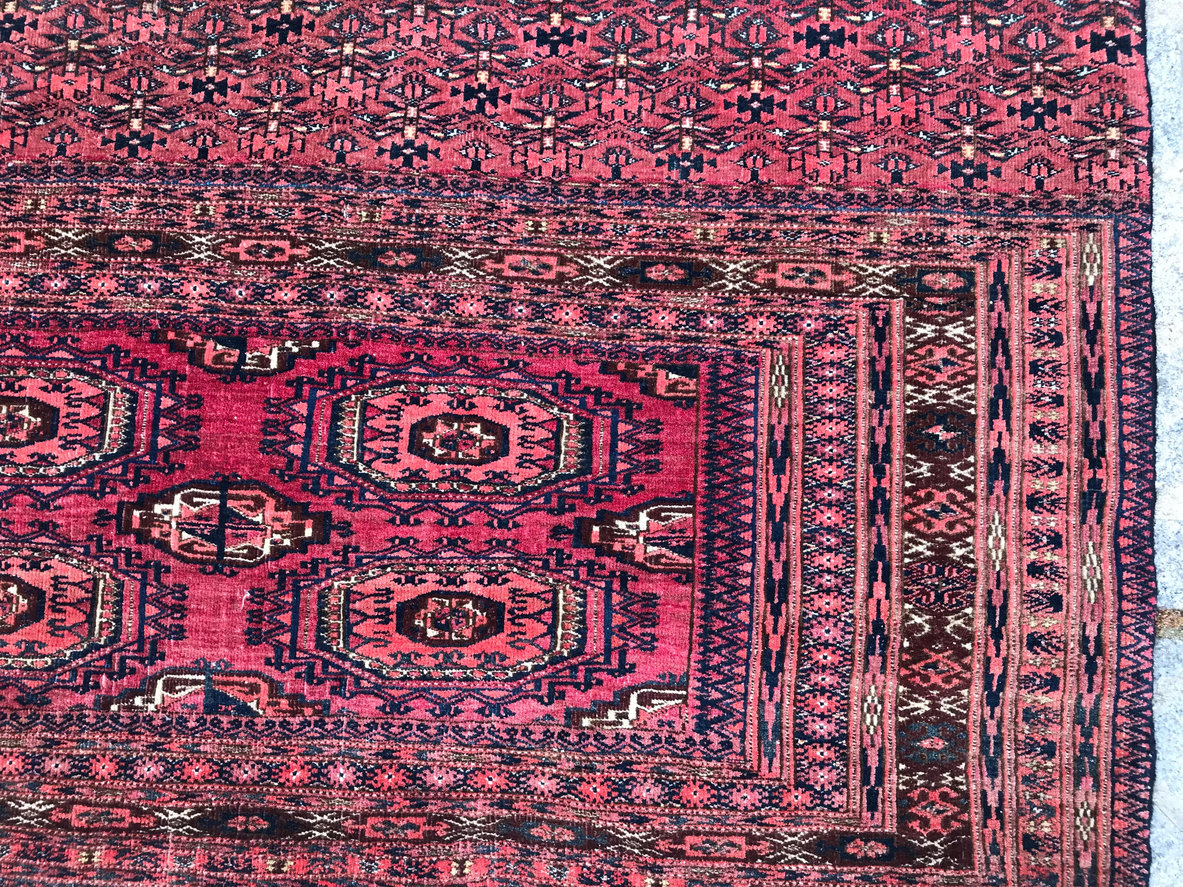 Late 19th century Turkmen Yomut Afghan Chuval rug, originally for horse cover, with a Beautiful Turkmen tribal design and nice natural colors with pink, brown, red and blue, entirely and finely hand knotted with wool velvet on wool foundation.