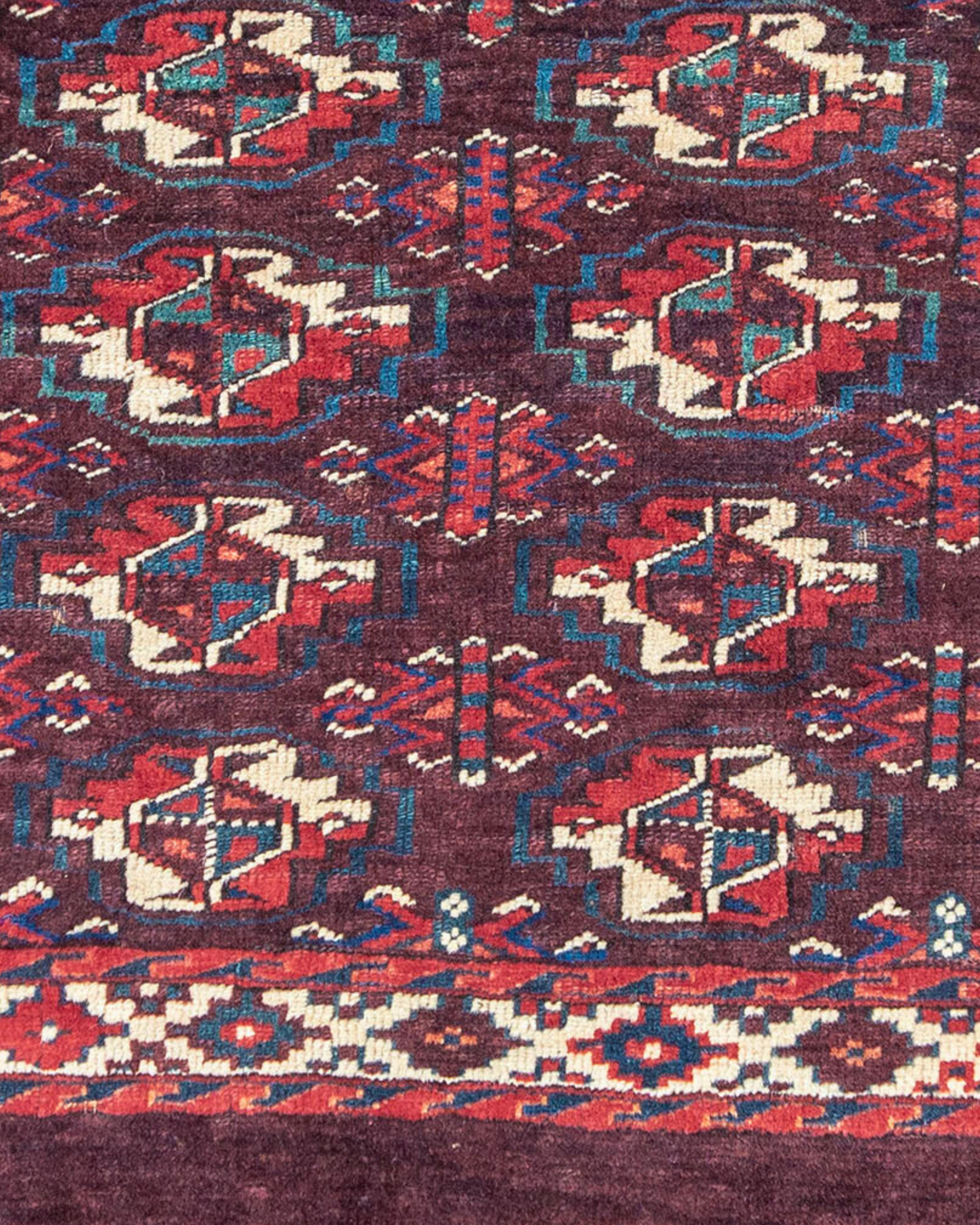 Ancien tapis turkmène Yomut Chuval, 19e siècle

Informations supplémentaires :
Dimensions : 1.10