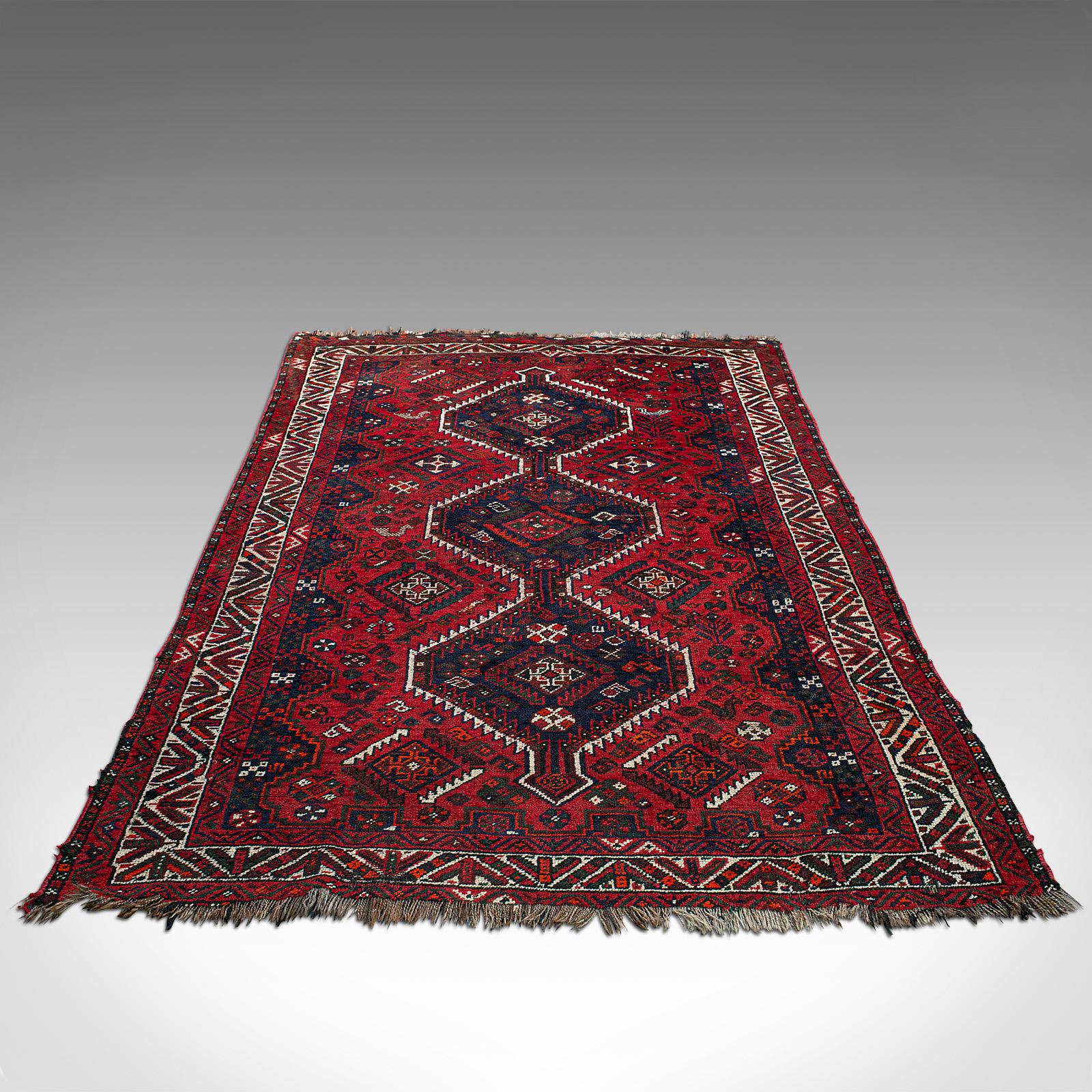 This is an antique Turkoman carpet. A Caucasian, hand woven lounge or hallway rug, dating to the late 19th century, circa 1900.

Of close to Qali size at 172cm x 257cm (67.75