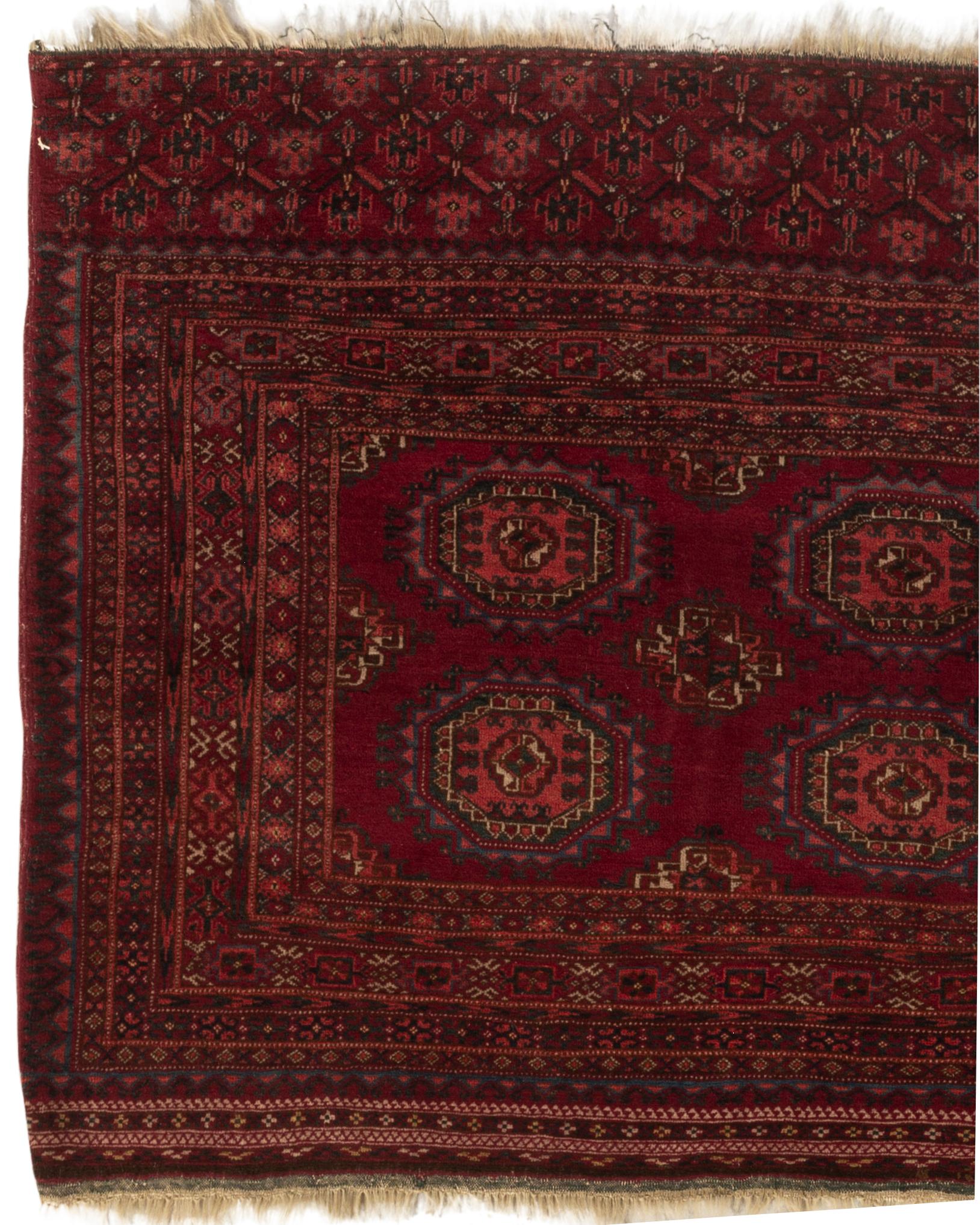 Antique Turkoman rug, circa 1880. A Turkoman or Turkmen rug from Turkmenistan formerly part of the Soviet Union. These are tribal rugs easily identifiable by their colors and the ethnic symbols used in the weavings. This lovely small rug is a