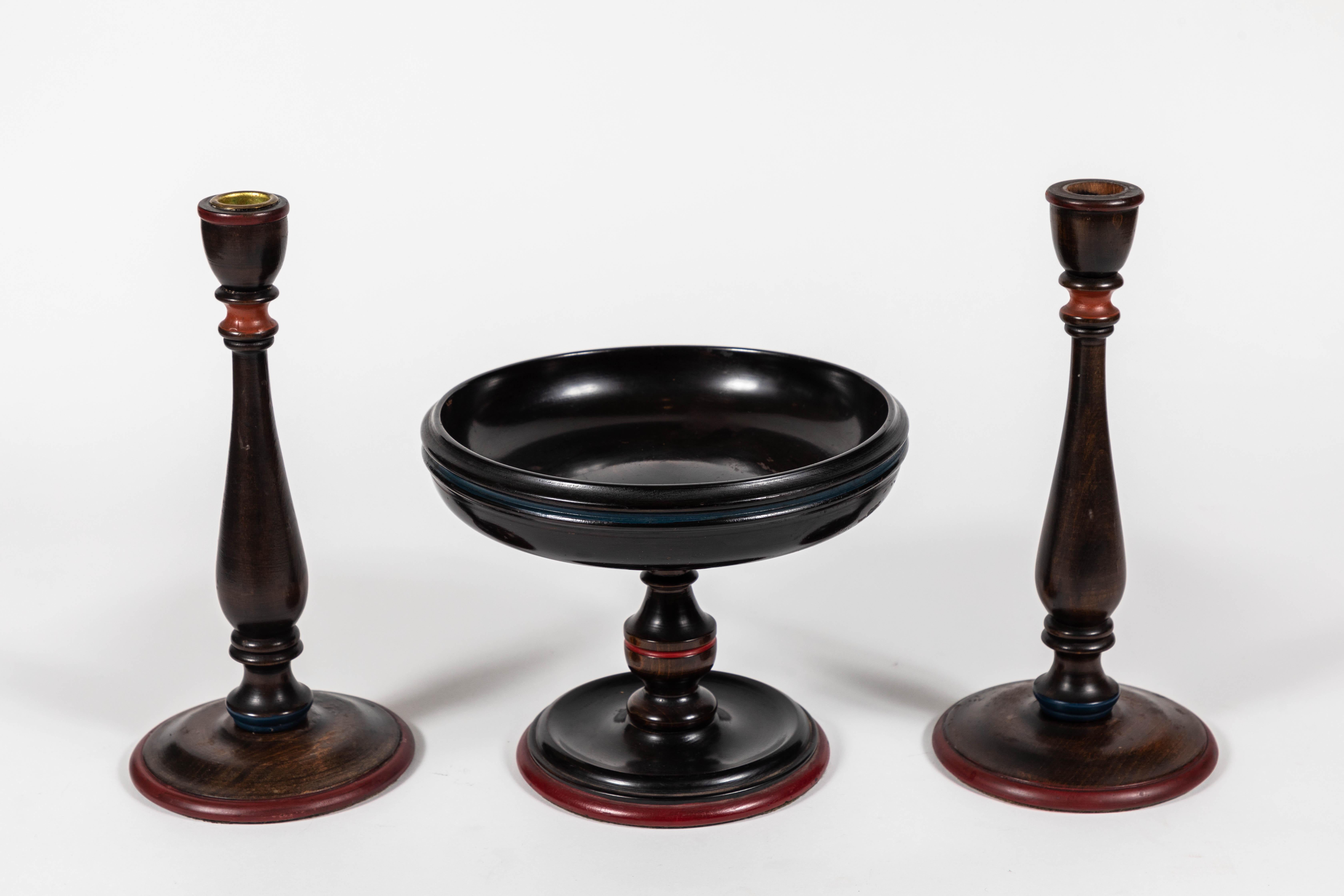 Antique turned wood console set with centre display footed bowl and candlesticks.

Measures: Footed bowl: 9