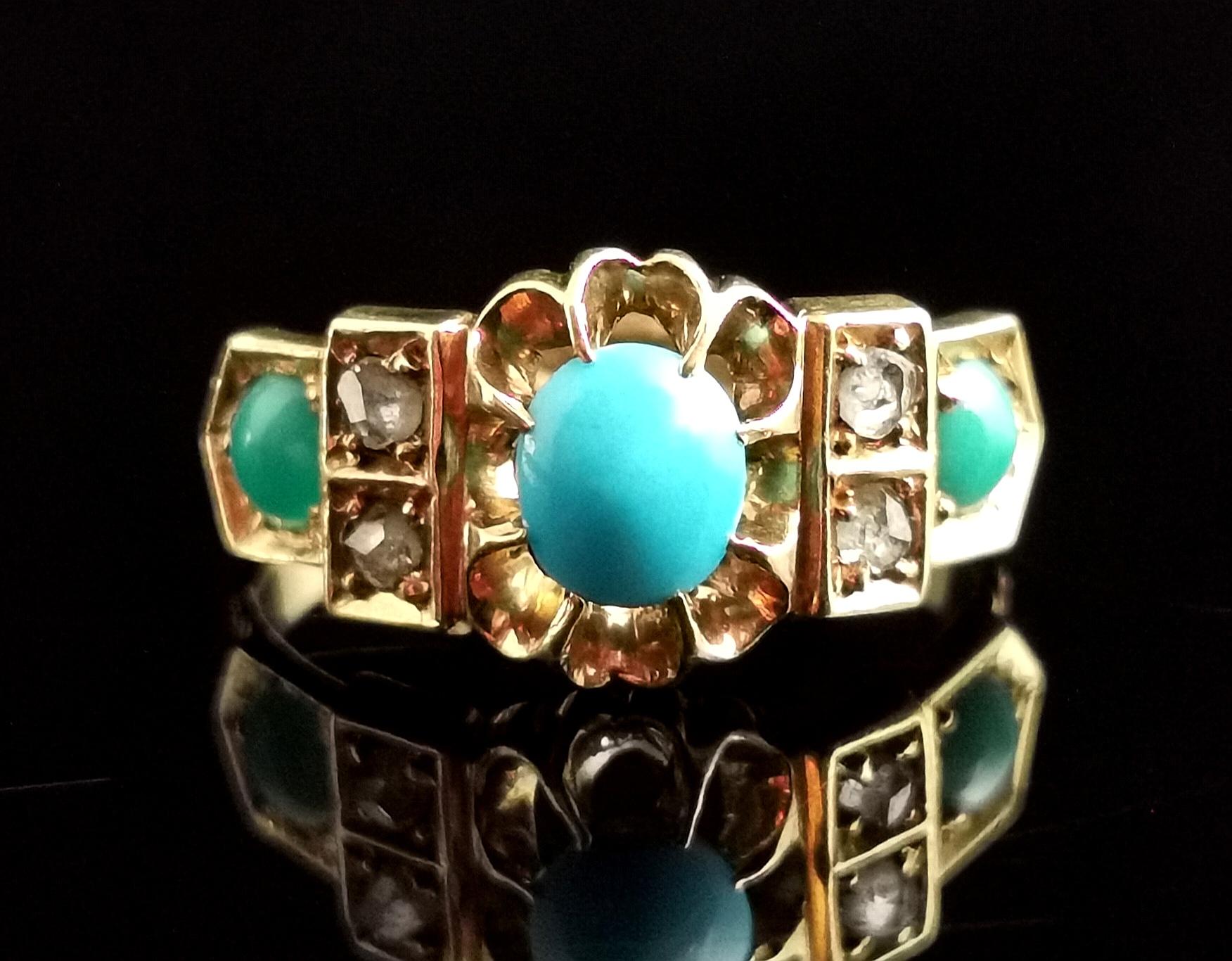 A truly beautiful antique, early 20th century Turquoise and diamond ring in 18kt yellow gold.

This ring has an unusual design and is truly a perfect combination of turquoise and diamond.

It is set in rich 18kt gold with stepped and engraved