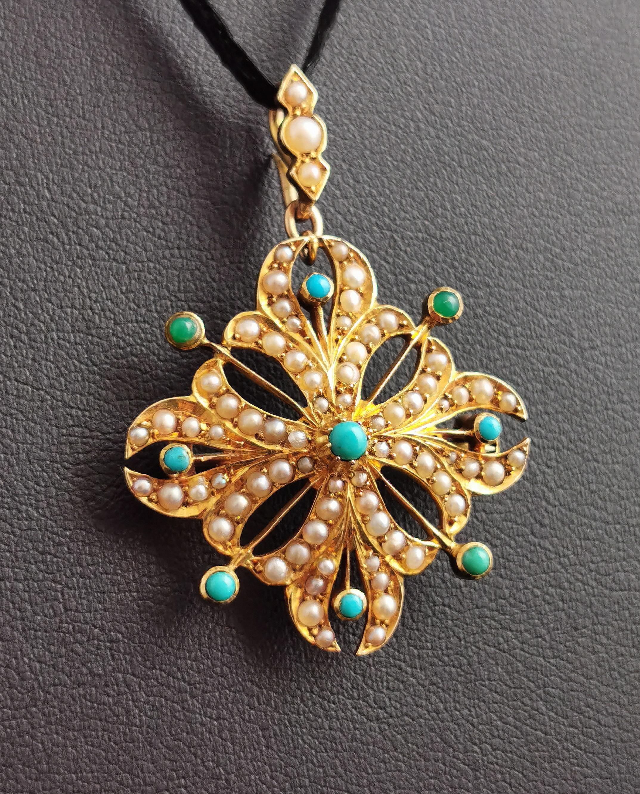 A truly stunning antique Art Nouveau era Turquoise and pearl pendant brooch in 15kt yellow gold.

It is a beautifully crafted pieced, very well made and has an elaborate openwork design in a scrolling diamond shape set with creamy seed pearls, there