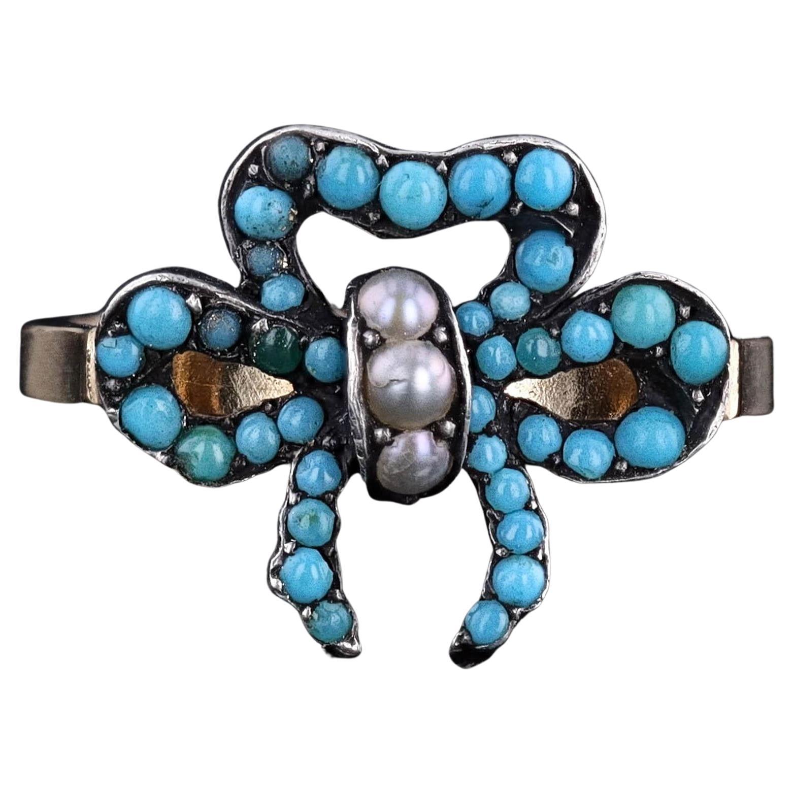 Bague ancienne en or 14k et argent avec nœud en turquoise