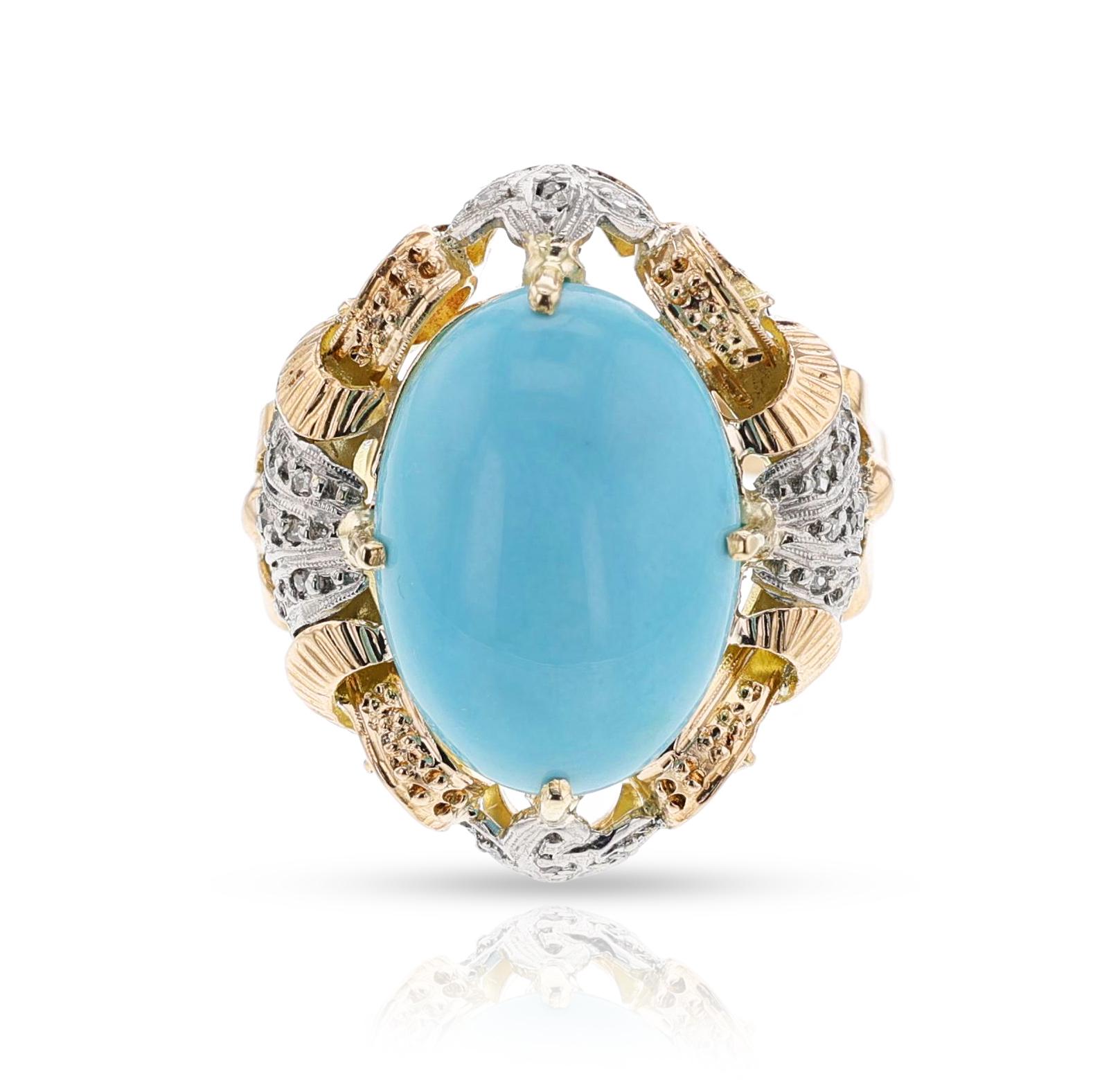 An Antique Turquoise Cabochon and Diamond Ring made in 18k Gold. The turquoise is appx. 16 x 11 MM. The ring size is US 7.75. The total weight is 9.35 grams. 