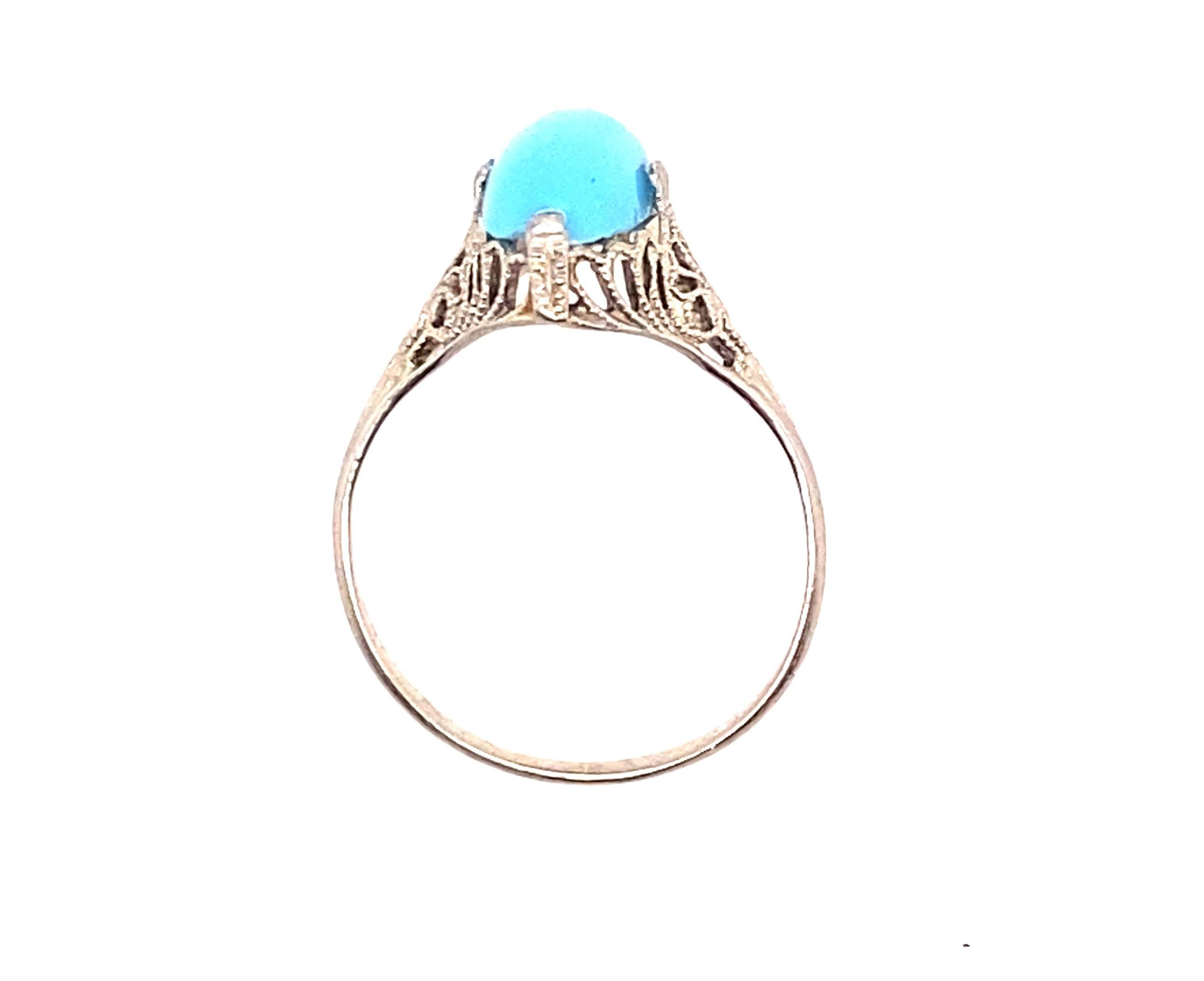 Vintage Turquoise Cocktail Ring 14K White Gold Antique Art Deco Filigree

 

Features a Genuine 12 x 6mm Natural 2.00ct Oval Cabochon Turquoise Gemstone

Hand Engraved Filigree

Perfect for Any Occasion

Solid 14K White Gold 

Circa 1920's

The Art
