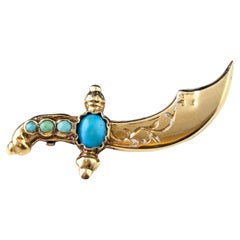 Antique Turquoise dagger brooch, 9k gold