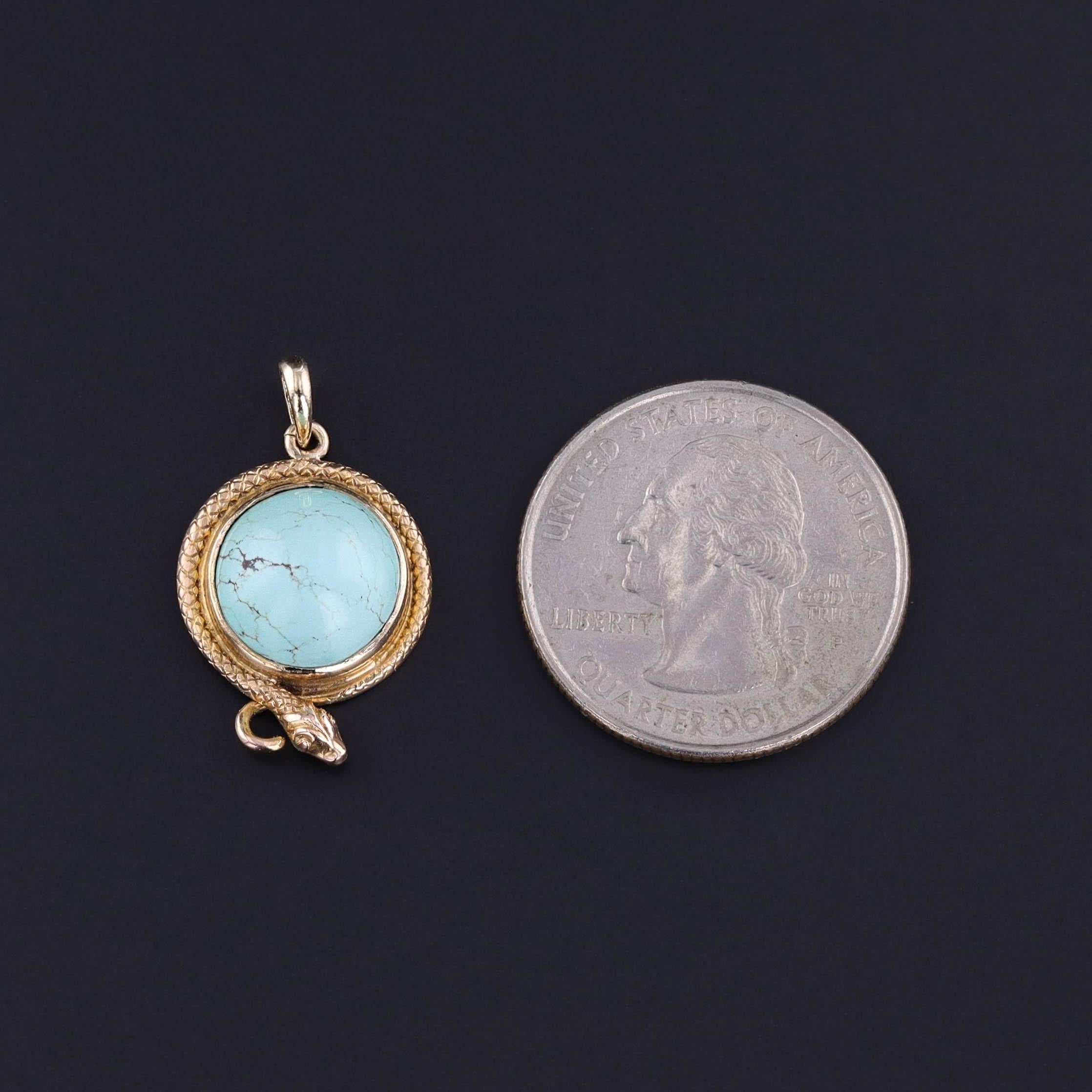 Antique Turquoise Snake Charm: This exquisite 14k gold pendant showcases a finely detailed snake coiled around a turquoise cabochon. Once an antique stickpin (circa 1900), our jeweler transformed it into a charming pendant by removing the pin and