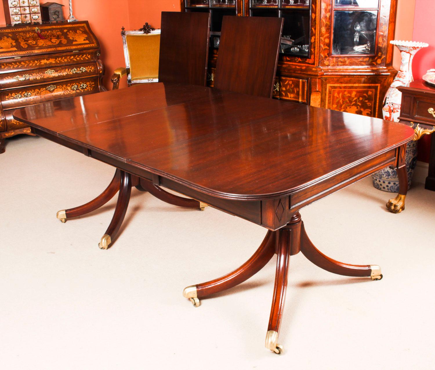 Mahogany Antique Twin Pillar Regency Dining Table and 10 Regency Chairs, 19th Century