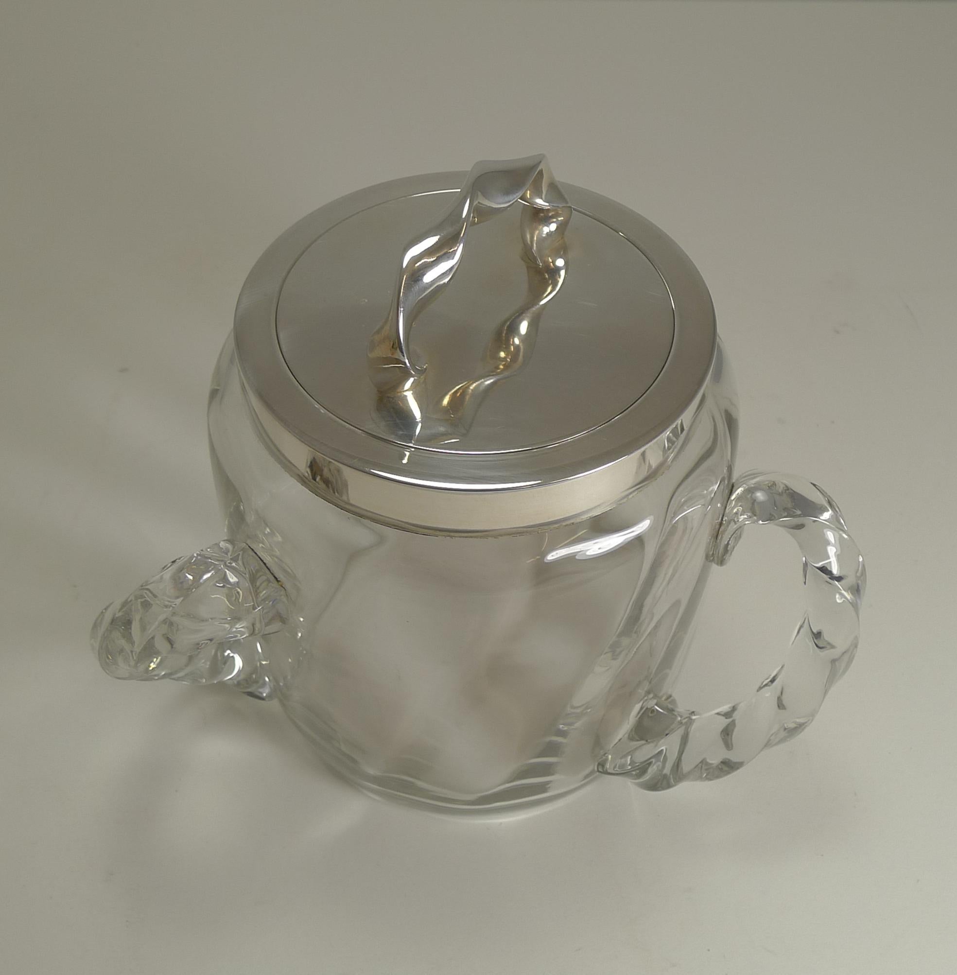 A really unusual biscuit box (it would make the most wonderful ice bucket too); made from glass and silver plate which is marked EPNS and 1/0 which I believe is made from the famous German maker, WMF (WÜRTTEMBERGISCHE METALLWARENFABRIK), and would