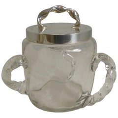 Antigua galletera retorcida de tres asas de cristal y chapa de plata, circa 1890