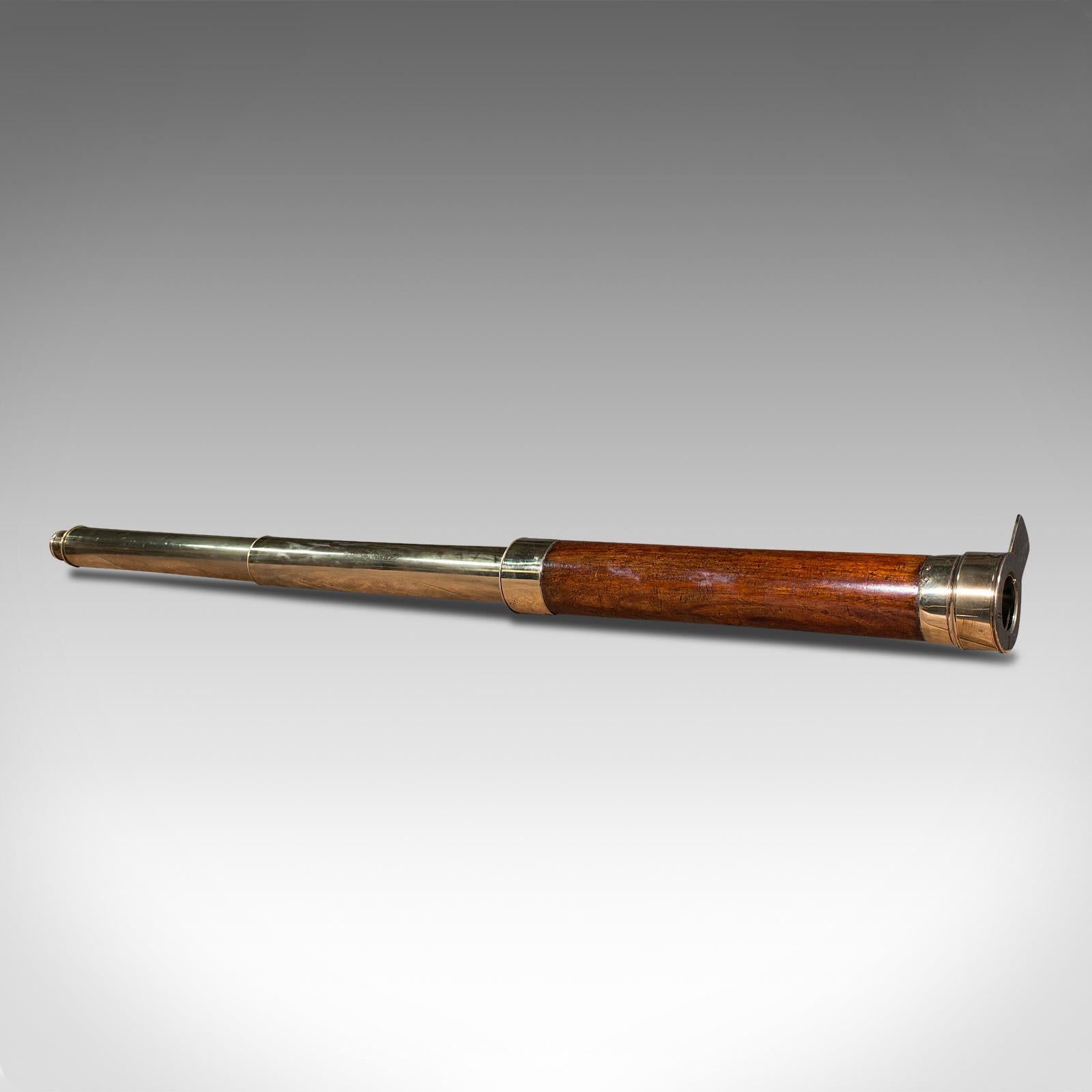This is an antique two draw telescope. An English, mahogany and brass refractor for terrestrial or astronomical use, dating to the mid Victorian period, circa 1850.

Perfect for bird watching, landscape appreciation, wildlife, or maritime