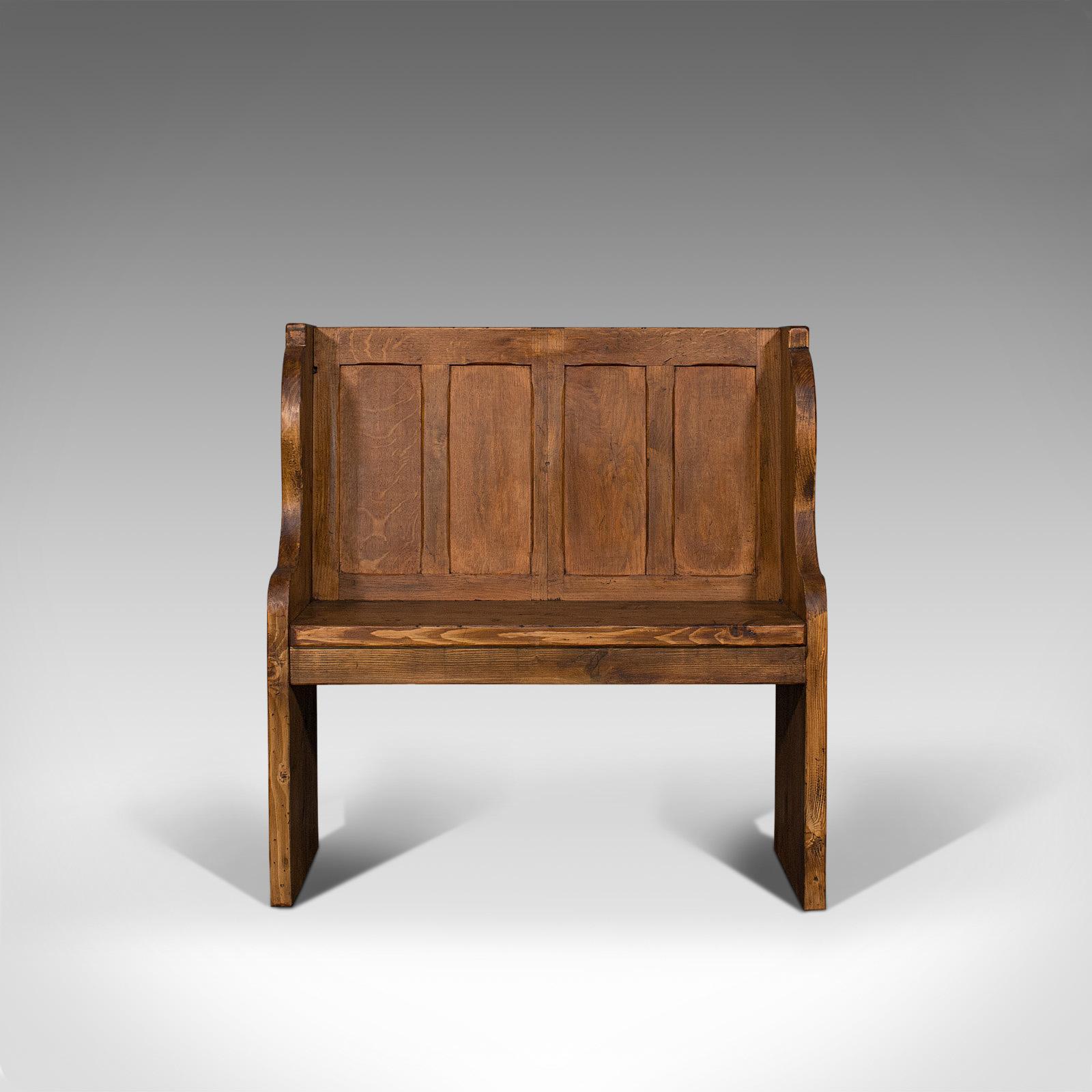 This is an antique two-seat settle. An English, oak and pine ecclesiastical pew or bench, dating to the late Victorian period, circa 1900.

Mellow tones and attractive form
Displays a desirable aged patina
Select oak and pine offers fine grain