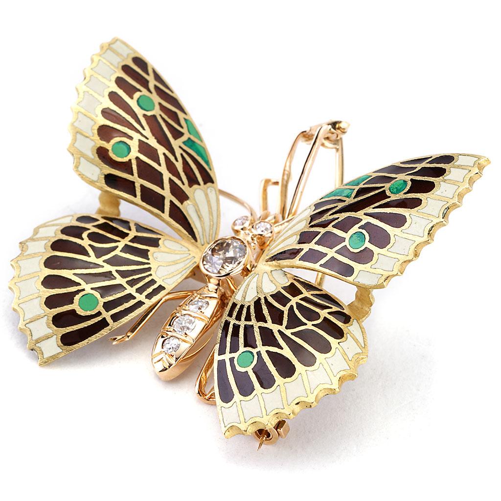 Cette épingle à papillon en émail ancien et diamants est en or jaune et rose 18 carats. Il contient un diamant européen de couleur champagne et de pureté I pesant 0,60 CTTW, des diamants européens de couleur G-H et de pureté VS pesant 0,20 CTTW.