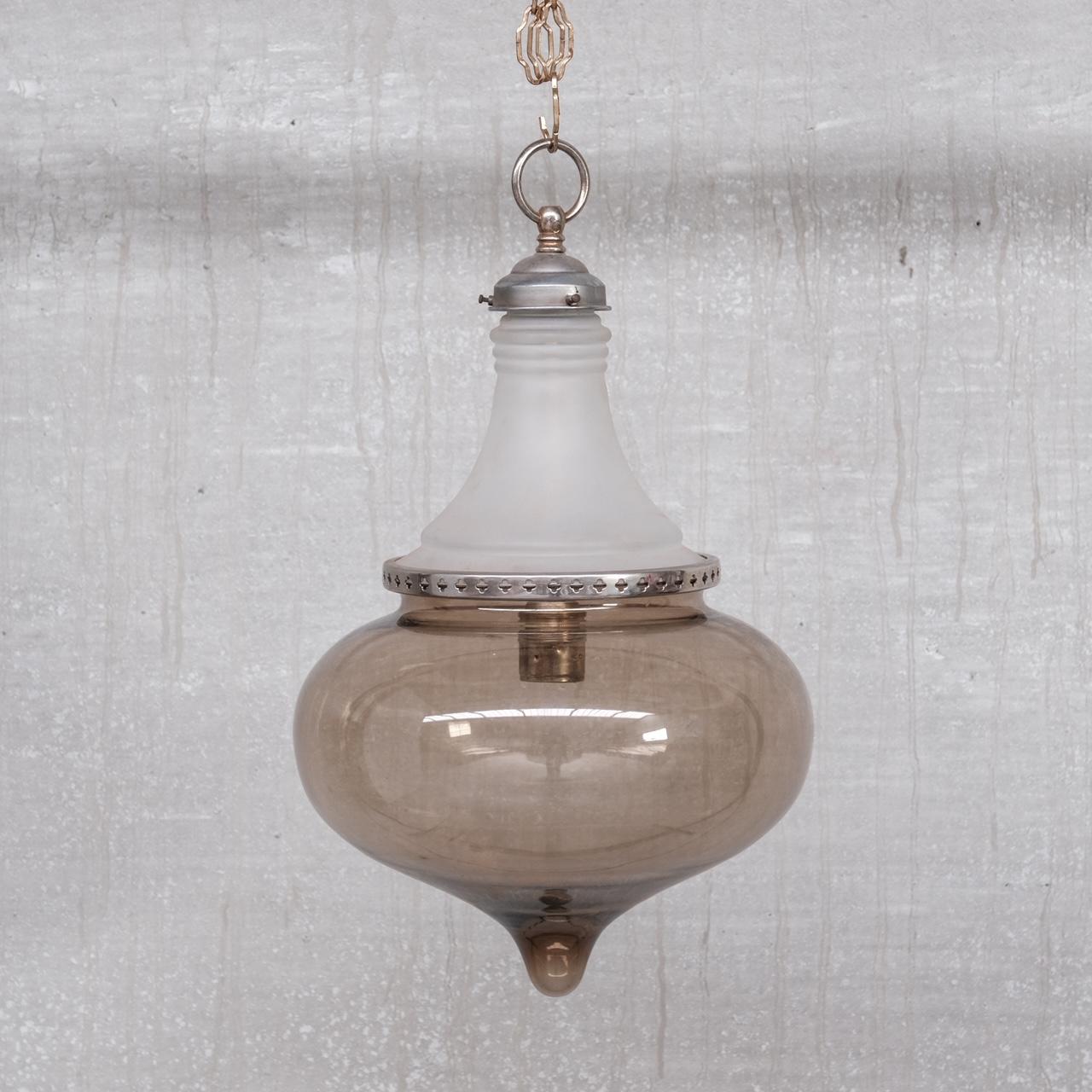 An antique pendant light. 

France, c1930s. 

Opaque glass top, unusual brownish large base. 

No ceiling rose or chain was retained but these are easily sourced online. 

An unusual rare model we have not had nor seen before. 

Since re-wired and