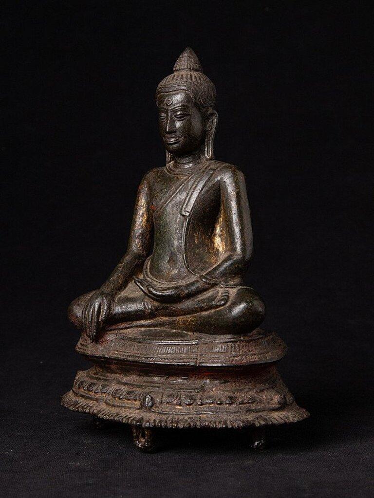 Material: bronze
19 cm high 
Very special !!
Bhumisparsha mudra
Originating from Thailand
13th Century
With traces of the original 24 krt. gilding.
 
