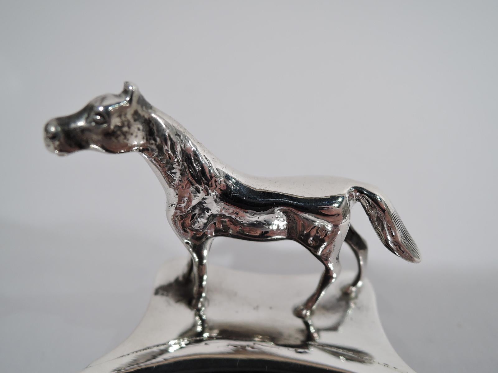 American sterling silver vide-poche, circa 1920. Round bowl with shaped handle to which Is mounted the figure of a horse. Fully marked including New York maker’s (Herbst & Wassall) and retailer’s (Udall & Ballou) stamps, and no. 2057. Weight: 1.8