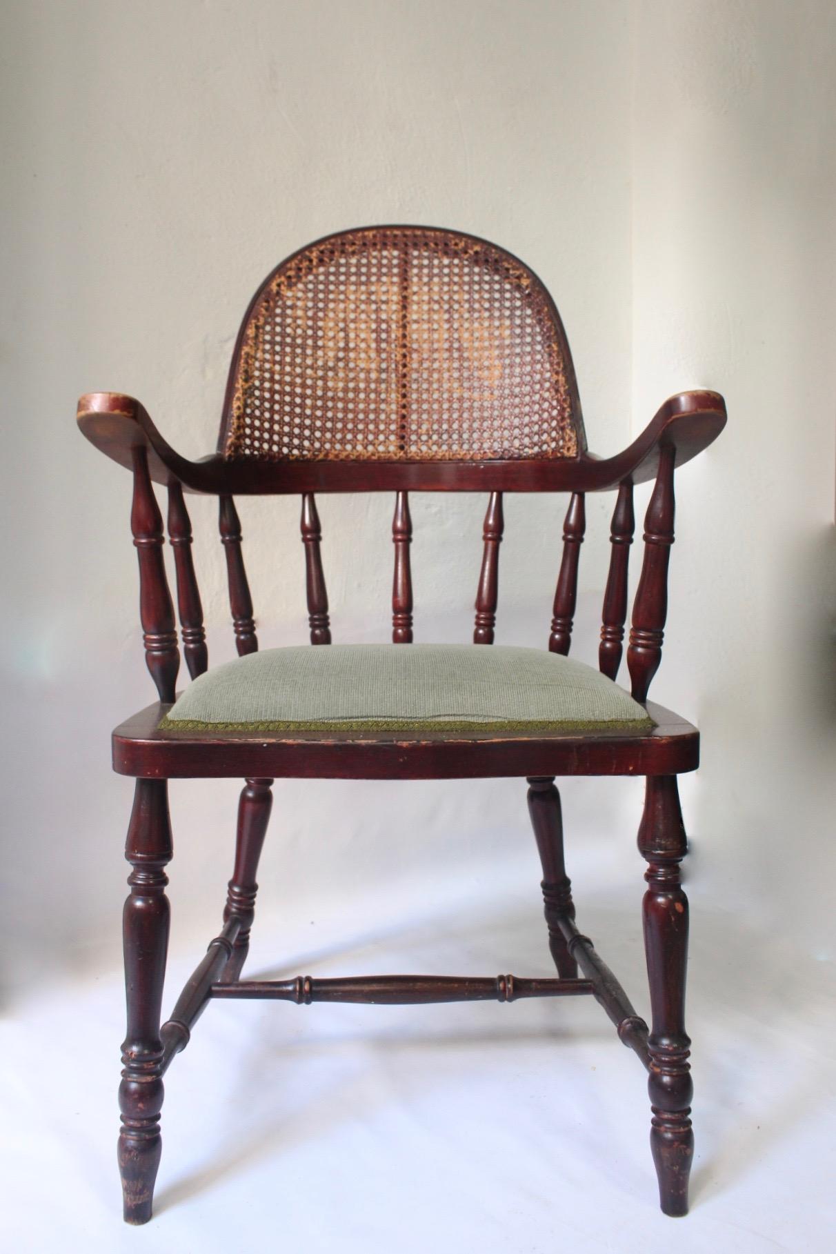 Antique uncommon English Windsor stick back caned chair, England, late 19th century.
Uncommon model of this Classic Country chair, with caned woven back and original upholstery.
 