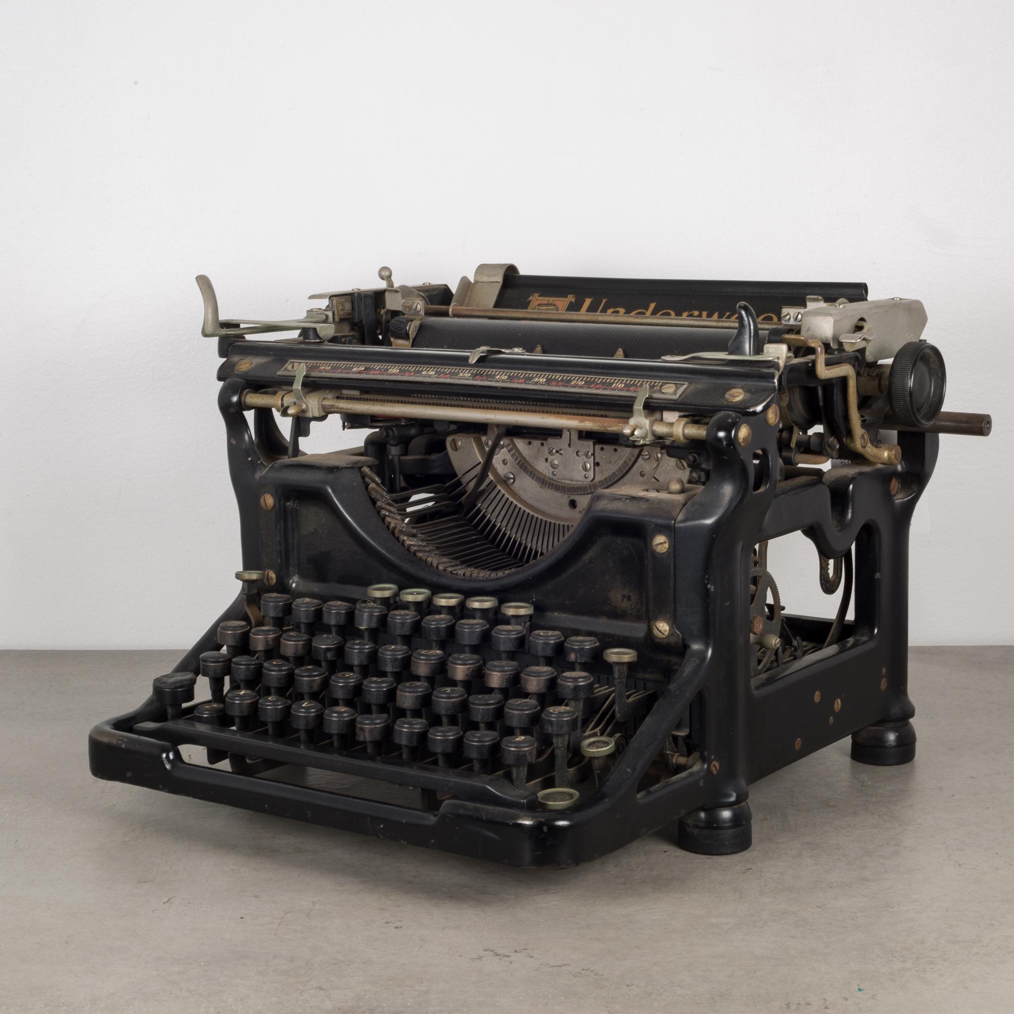 About

This is an original Underwood typewriter #10 with a 10 inch carriage and an open-frame design. The serial number is 4085977-10 stamped in the inside. The keys on the top row are nickel and glass. All the keys work properly but the carriage