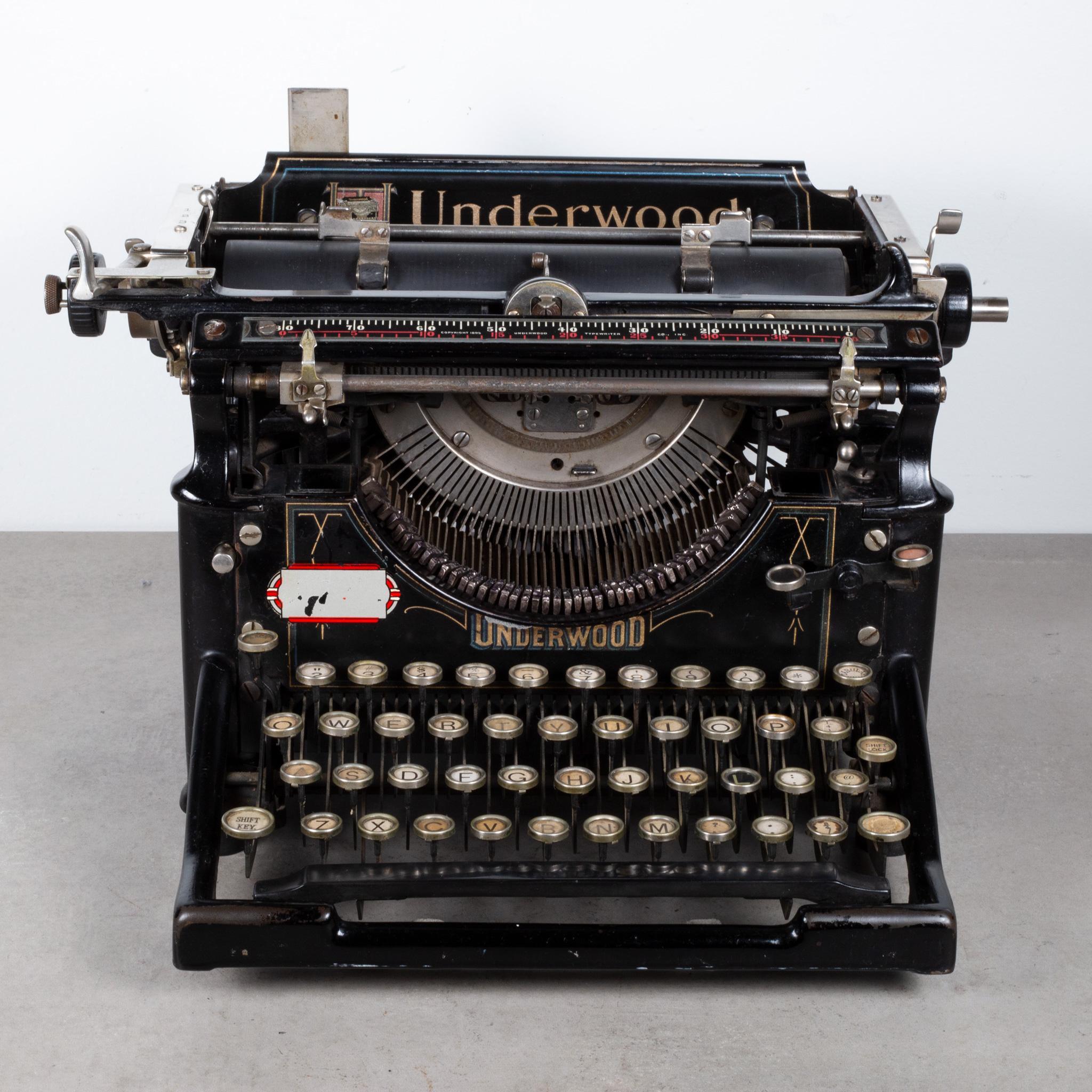 ABOUT

An original Underwood typewriter No.5 with a 15 inch carriage and an open-frame design. The typewriter works well and functions properly. Ribbon is good. The serial number is #732307 stamped in the inside. Original gold lettering. The keys
