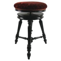 Fauteuil de piano ancien tapissé de France, vers 1880