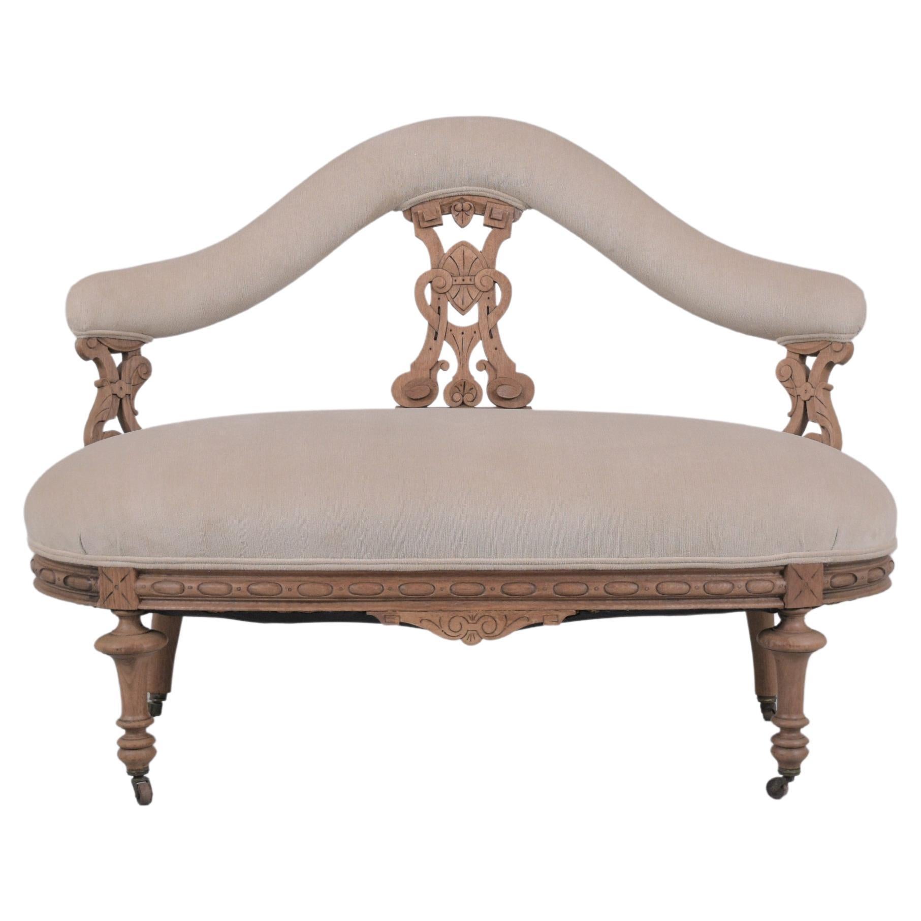 This 1900s lovely settee is in great condition and beautifully crafted out of walnut wood and has been completely restored and upholstery by our professional craftsmen team in the house. This extraordinary loveseat features a new bleached wood