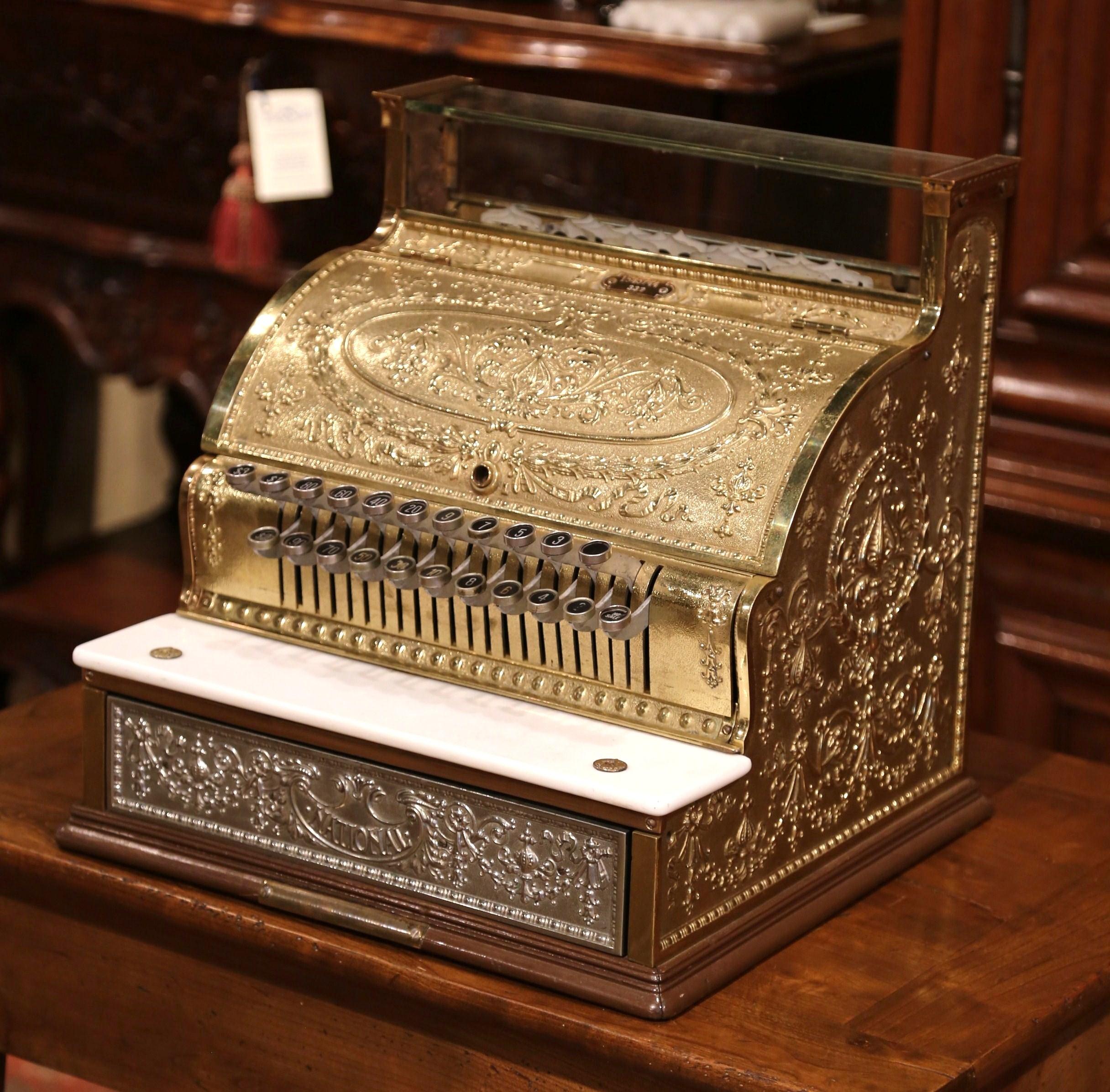 This antique cash register was built circa 1915, made in nickel, brass and marble, the register was restored recently, but for some reasons, the keys are stuck and the piece needs some attention. The cash register is in good condition with a rich