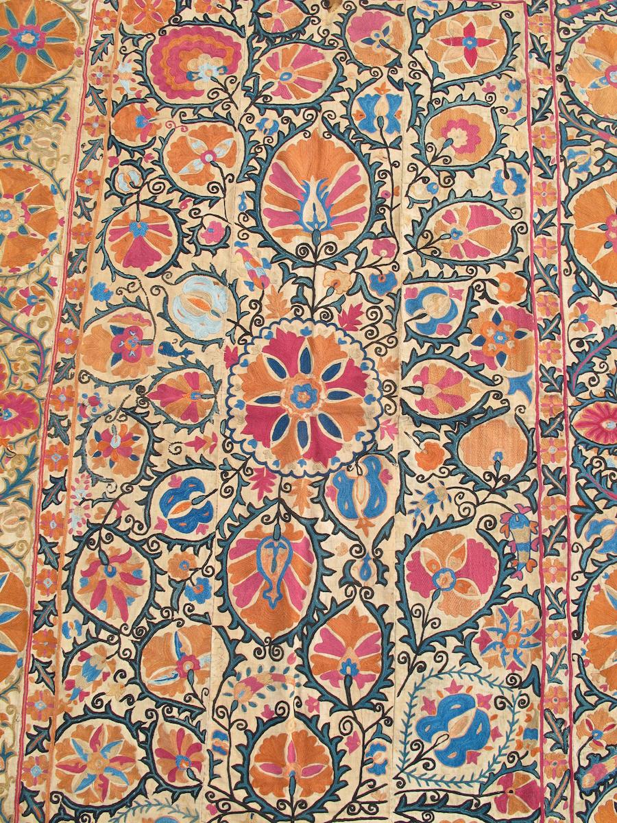 Antique Uzbek Bokhara Suzani Embroidered Textile Wall-Hanging Tapestry, Mid-19th Century

Three columns of design make up the field of this Suzani embroidery from the Central Asian city of Bukhara. In the central column, palmettes radiate in both