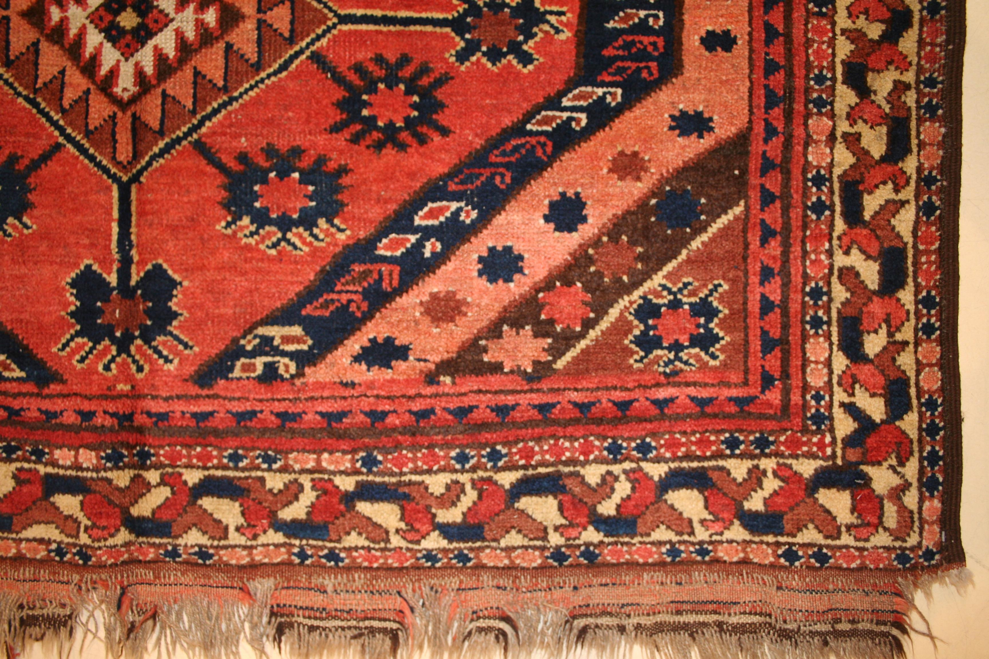 A richly coloured Uzbek tribal main carpet, decorated by a central row of three large diamonds with appendages. The rug is in very good condition, in full pile with original sides and ends. The colours are all natural and of vegetable origin. A