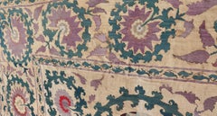 Antique Uzbekistan Suzani Textile with Medallion and Floral Vine Embroidery