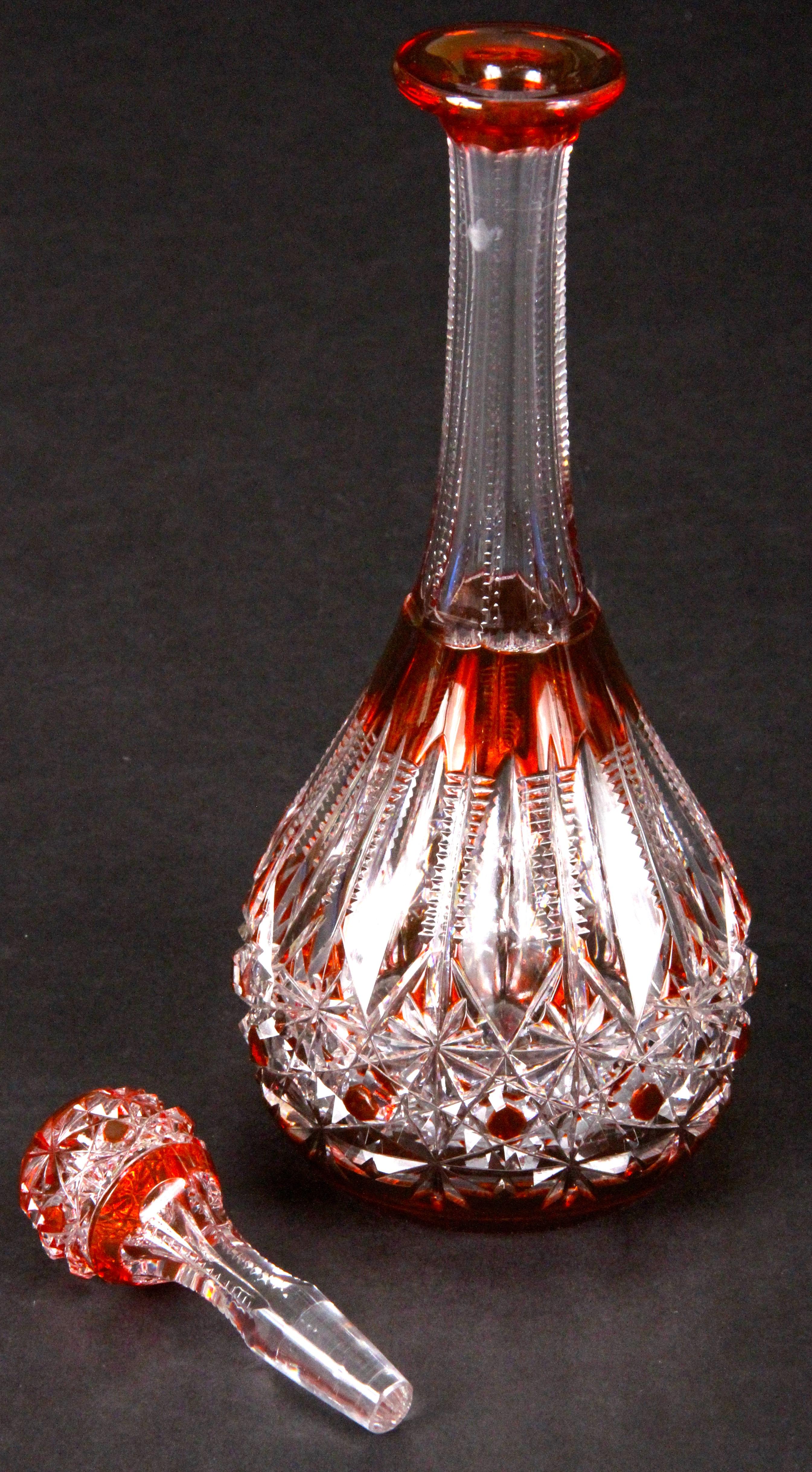 This lovely antique amber colored decanter is from Val Saint Lambert, Belgium, in the wonderful pattern called Marx. The decanter is hand-blow and handcut 
